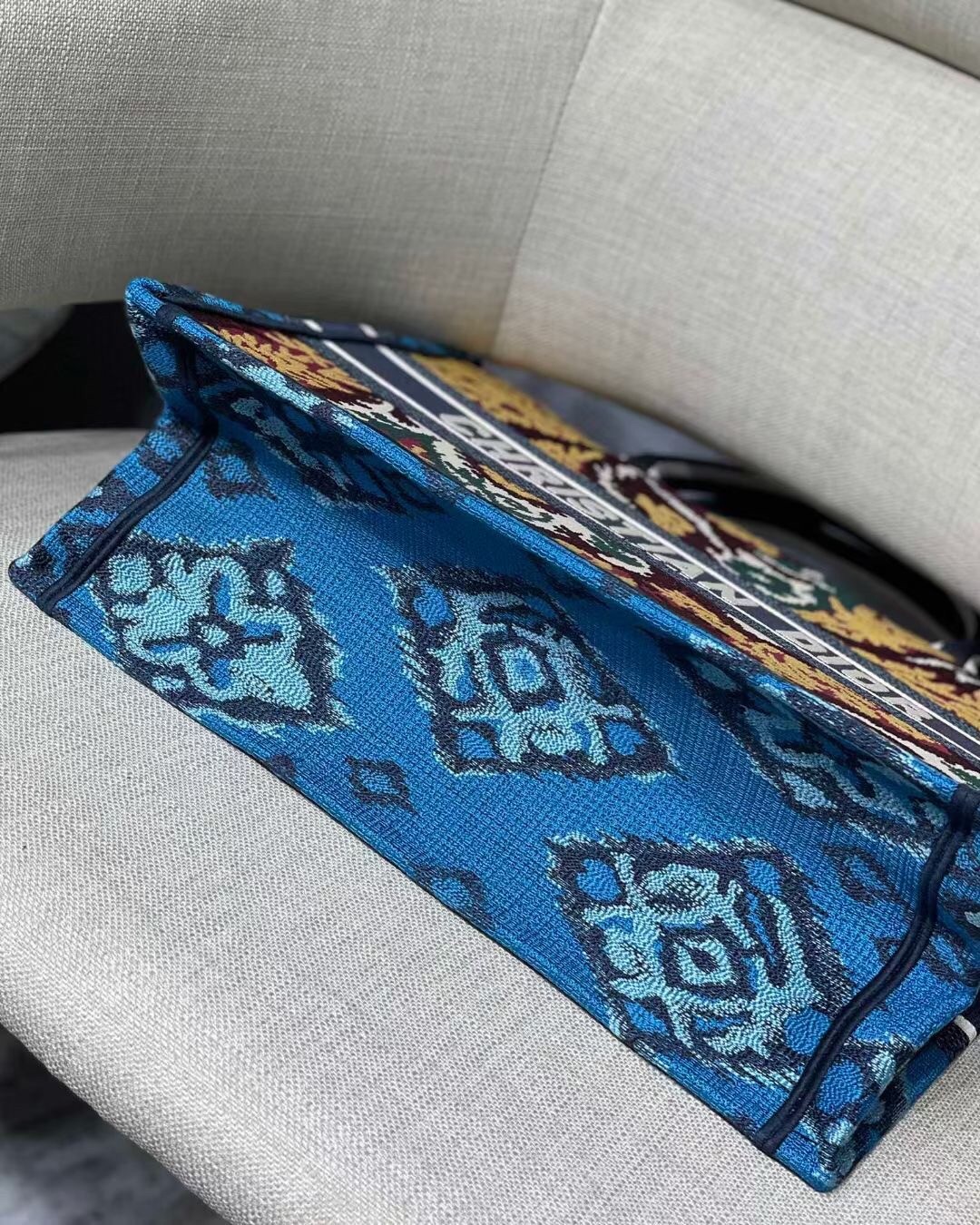 D*or small book tote in blue multicolor D*or paisley embroidery