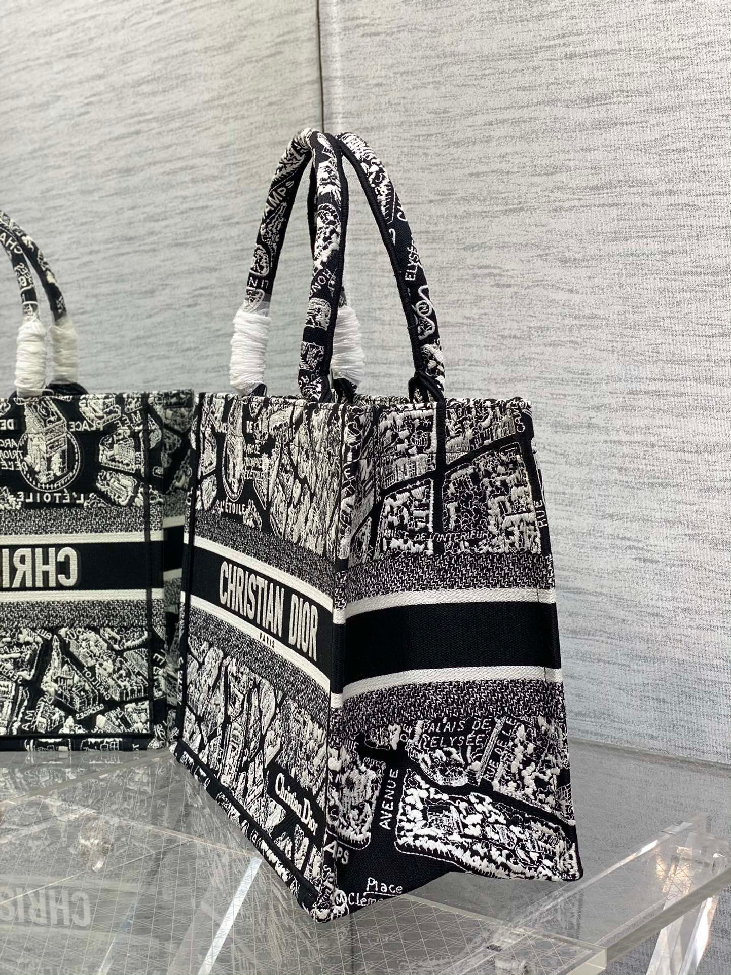 D*or medium book tote bag in black plan de paris embroidery
