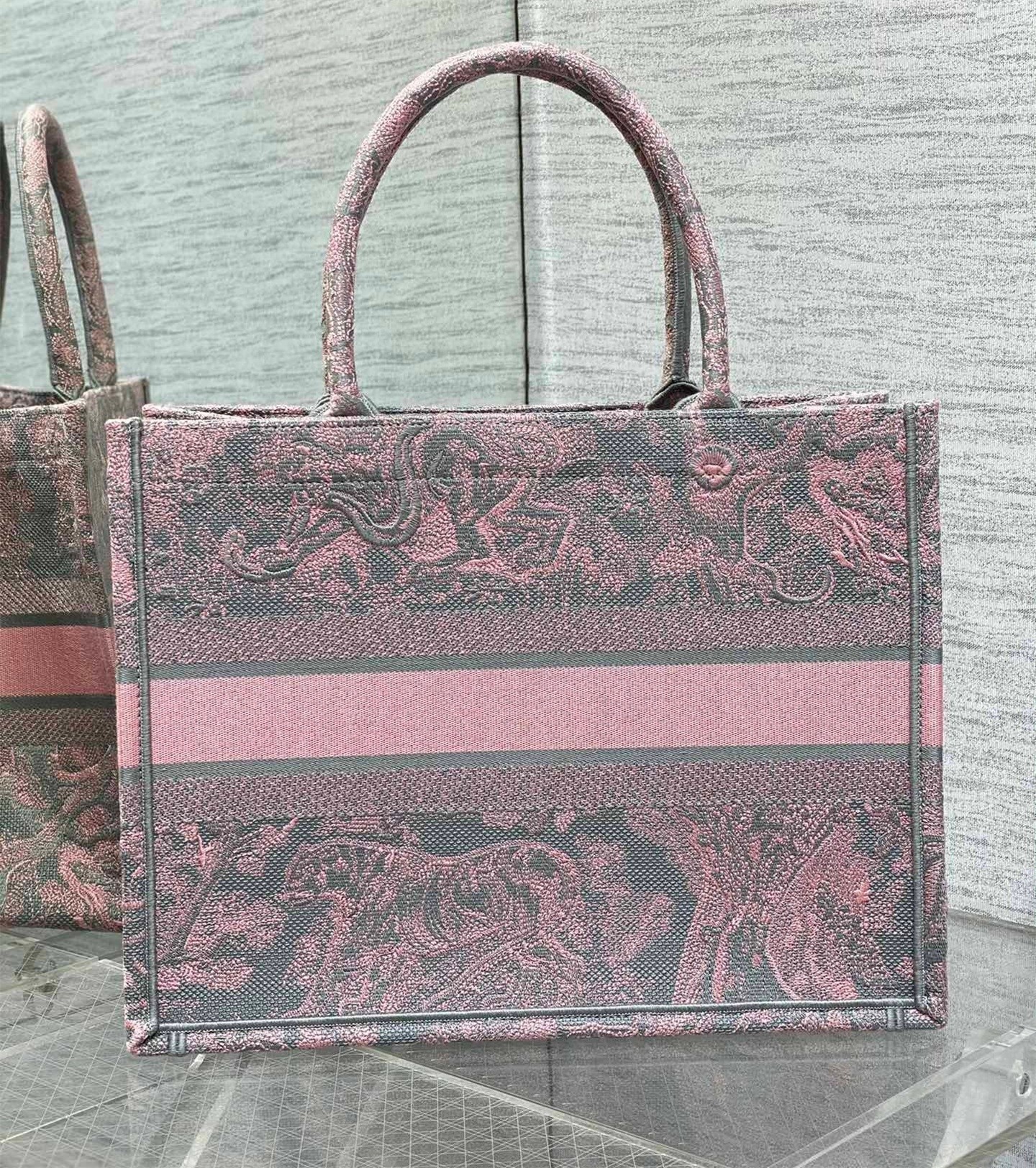 D*or medium book tote bag in grey and pink toile de jouy reverse embroidery