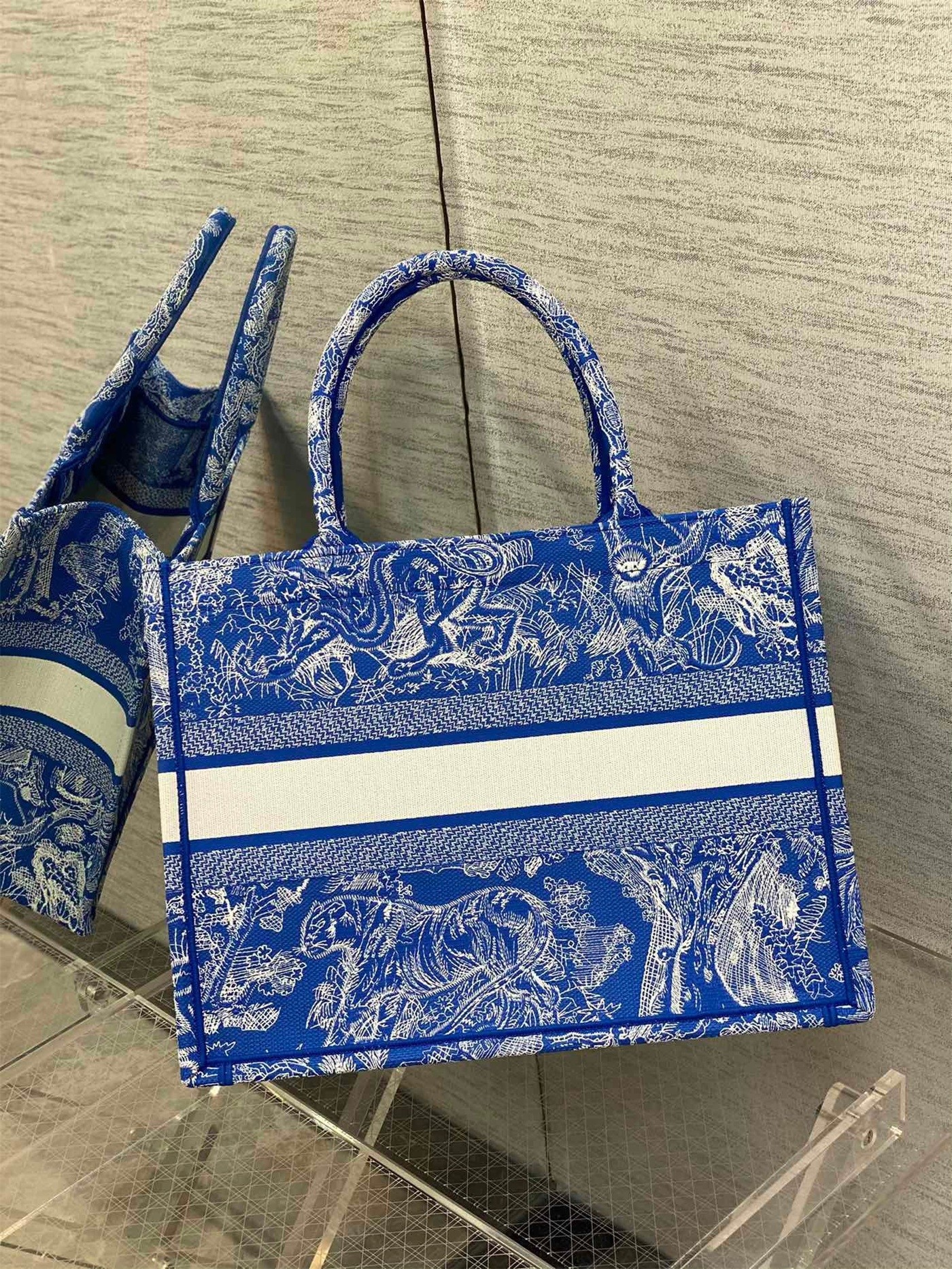 D*or medium book tote bag in fluorescent blue toile de jouy reverse embroidery