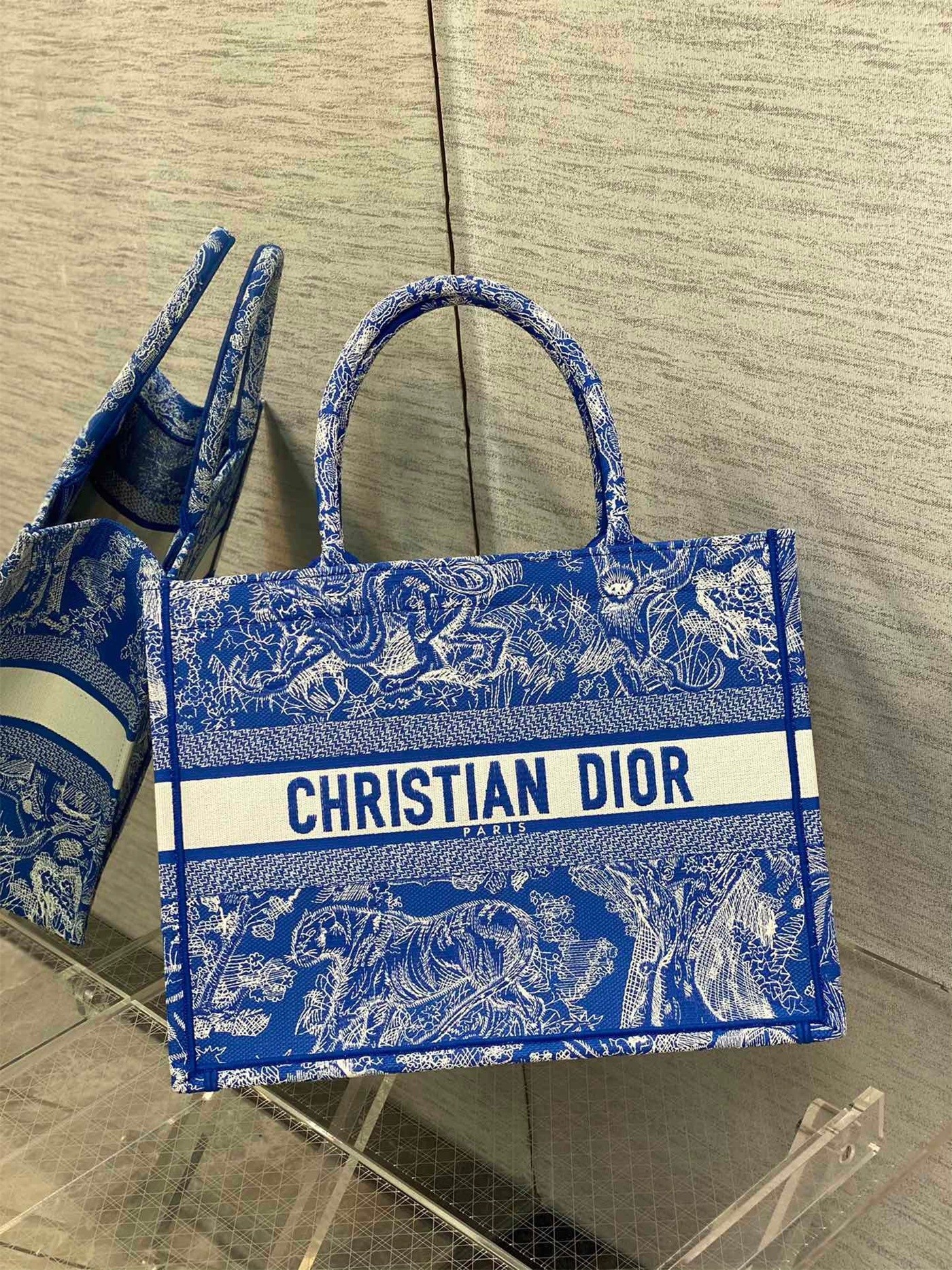 D*or medium book tote bag in fluorescent blue toile de jouy reverse embroidery