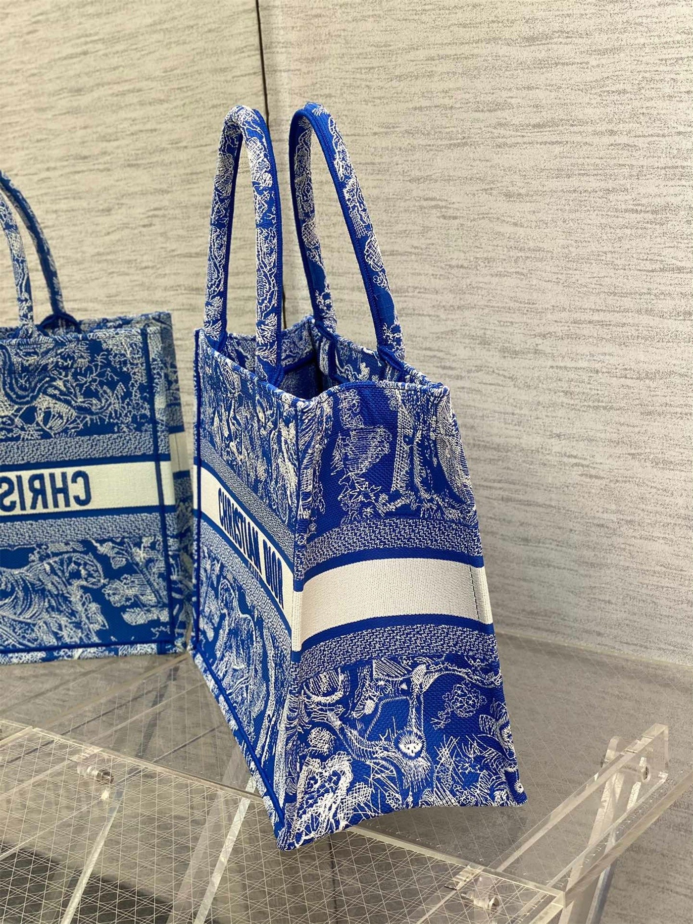 D*or medium book tote bag in fluorescent blue toile de jouy reverse embroidery