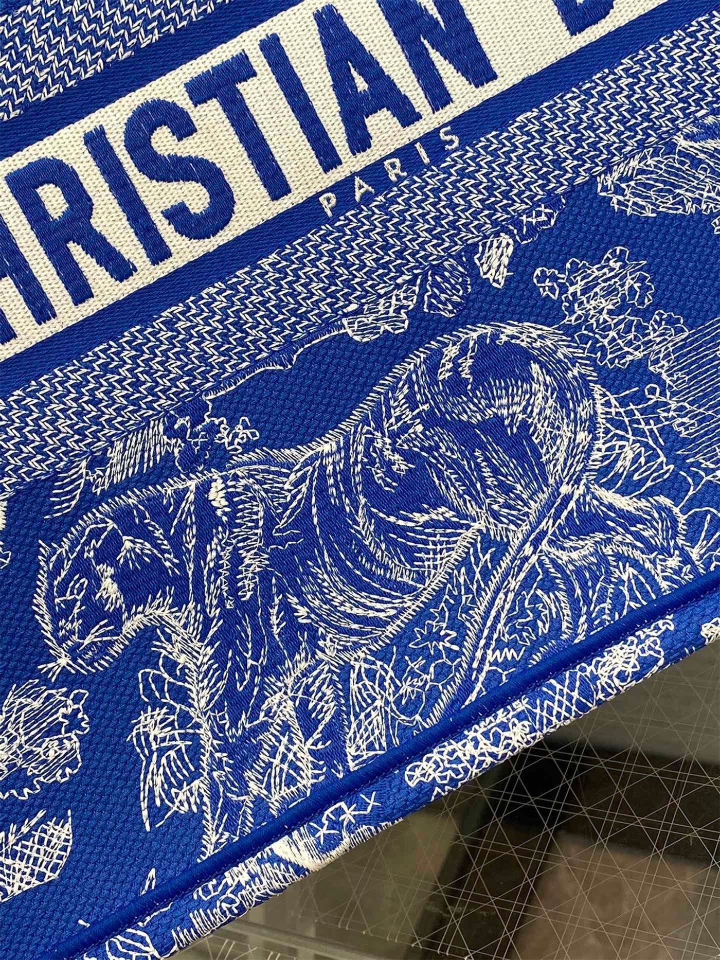 D*or medium book tote bag in fluorescent blue toile de jouy reverse embroidery