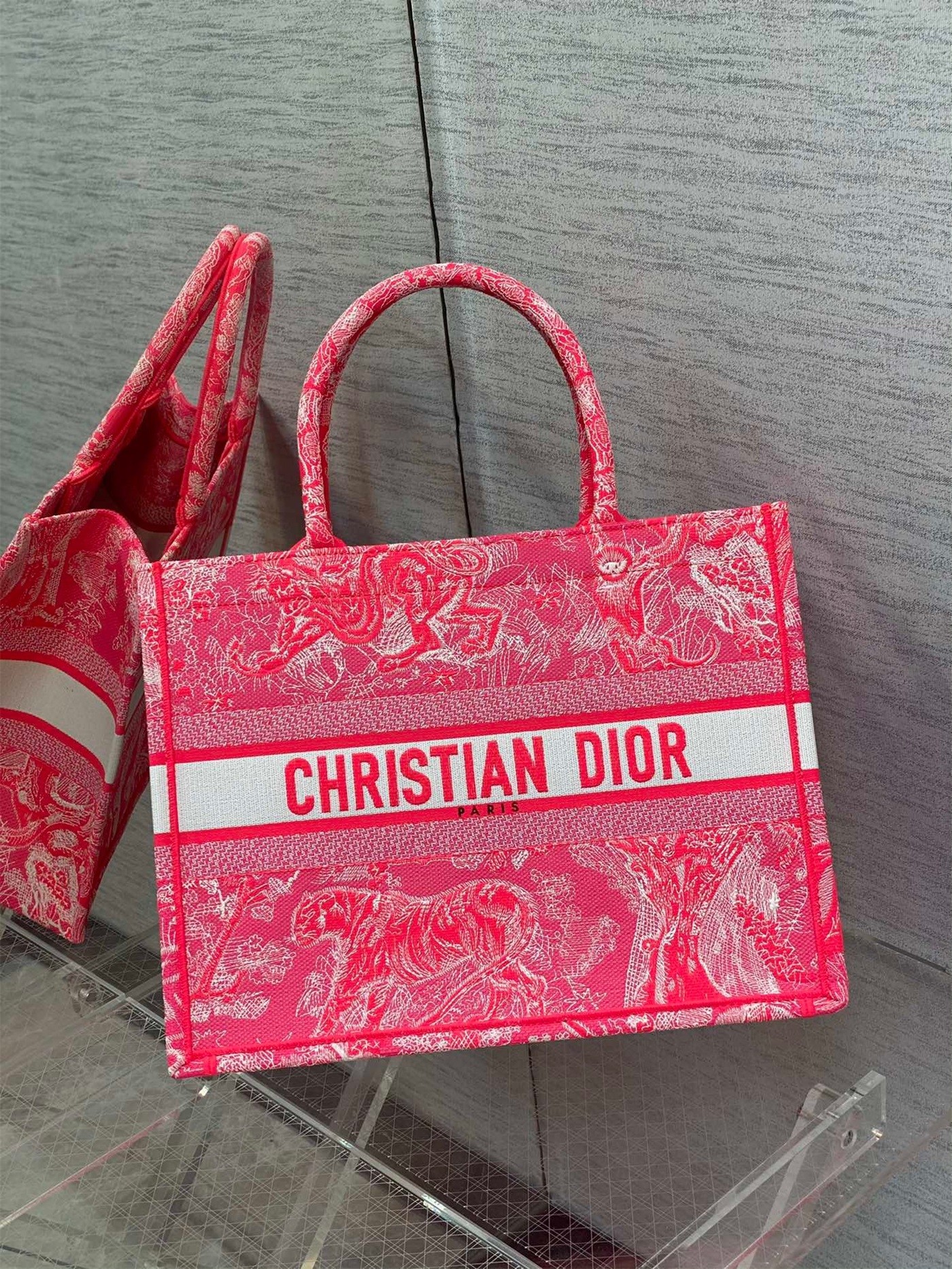 D*or medium book tote bag in fluorescent pink toile de jouy reverse embroidery