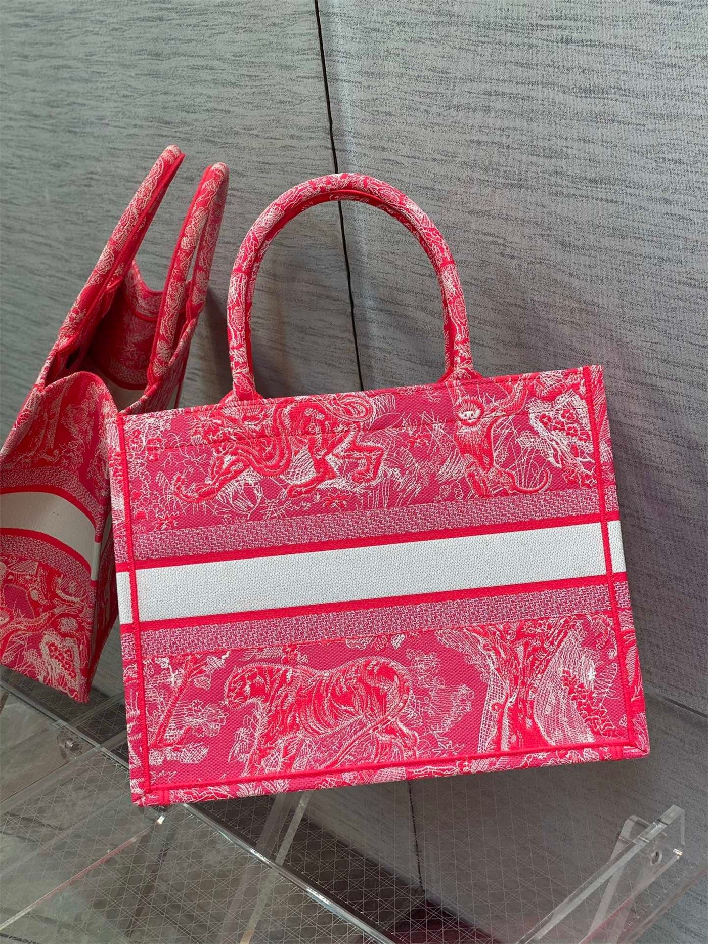 D*or medium book tote bag in fluorescent pink toile de jouy reverse embroidery