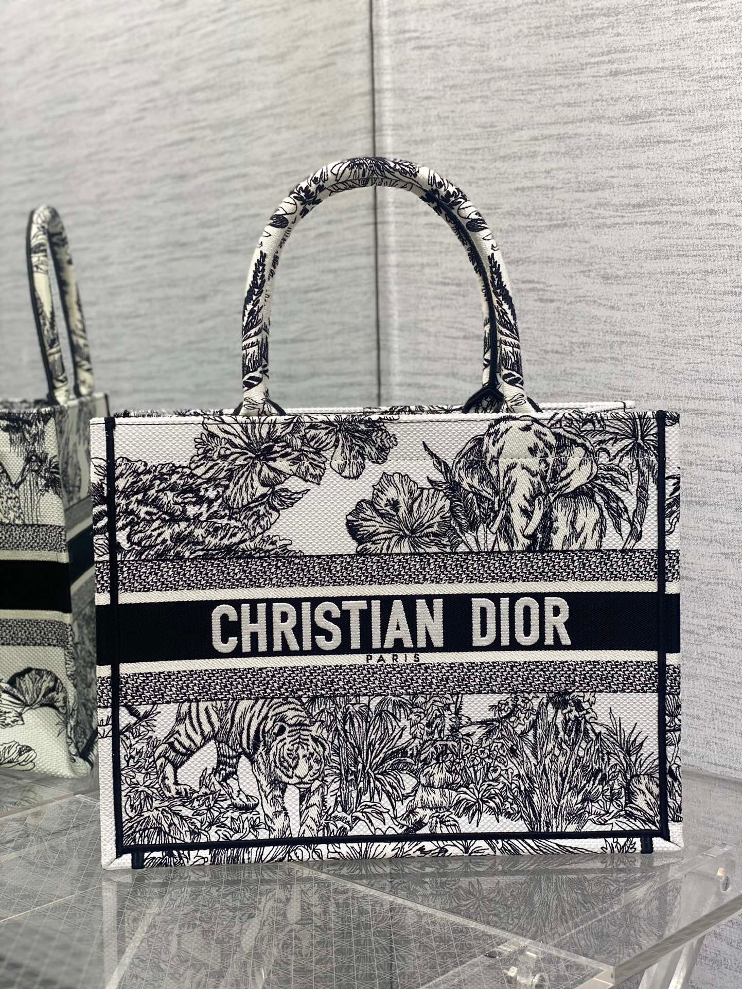 D*or medium book tote bag in white toile de jouy voyage embroidery