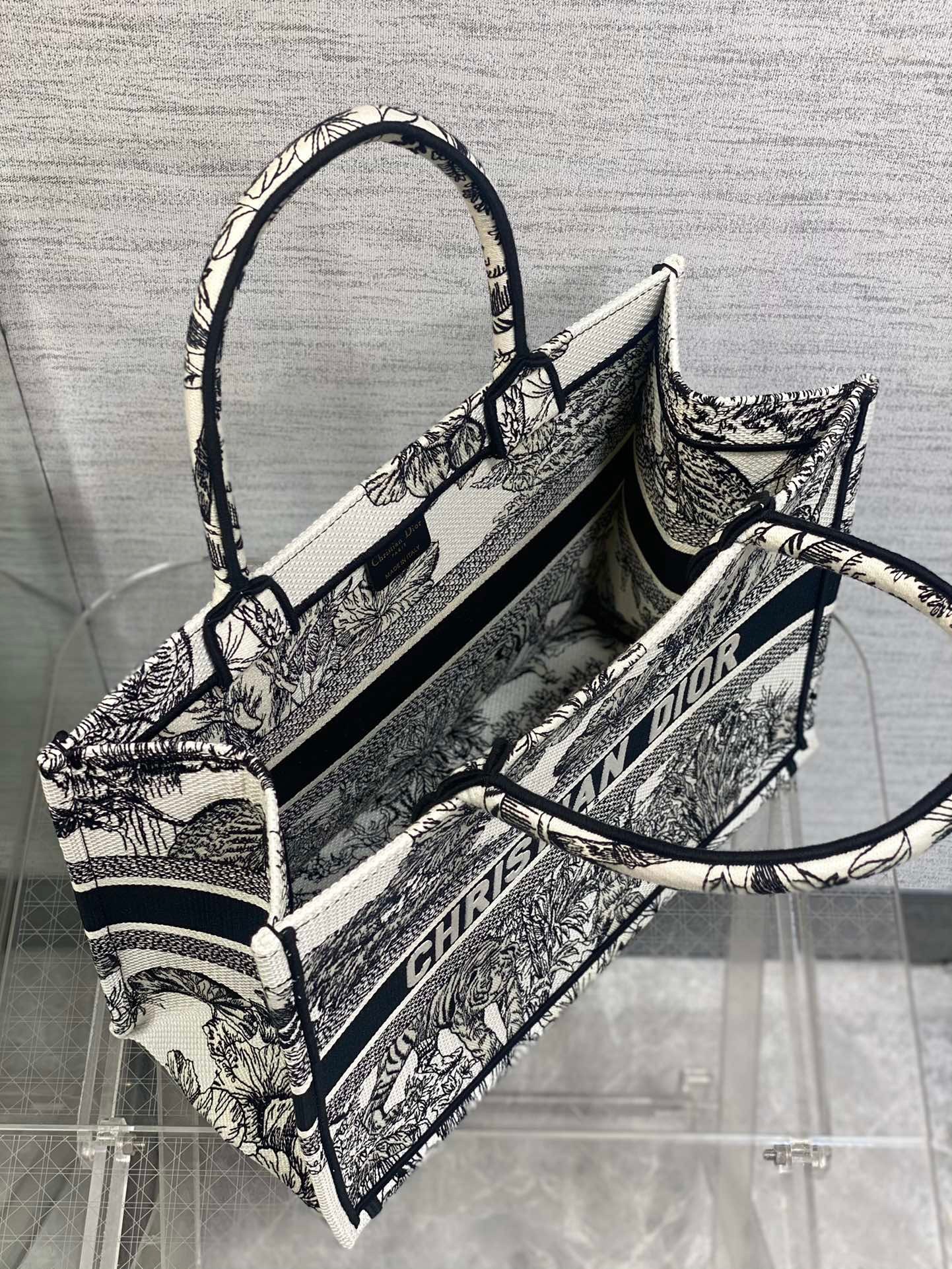 D*or medium book tote bag in white toile de jouy voyage embroidery