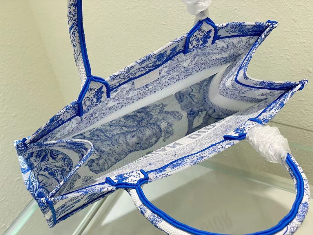 D*or medium book tote bag in blue transparent toile de jouy canvas