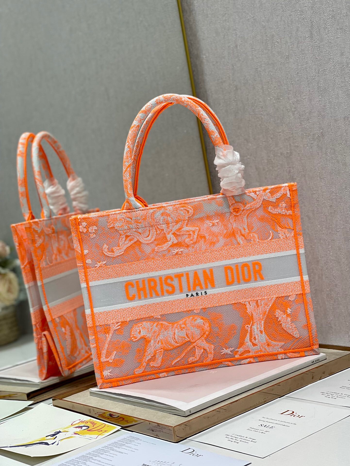 D*or medium book tote bag in orange transparent toile de jouy canvas