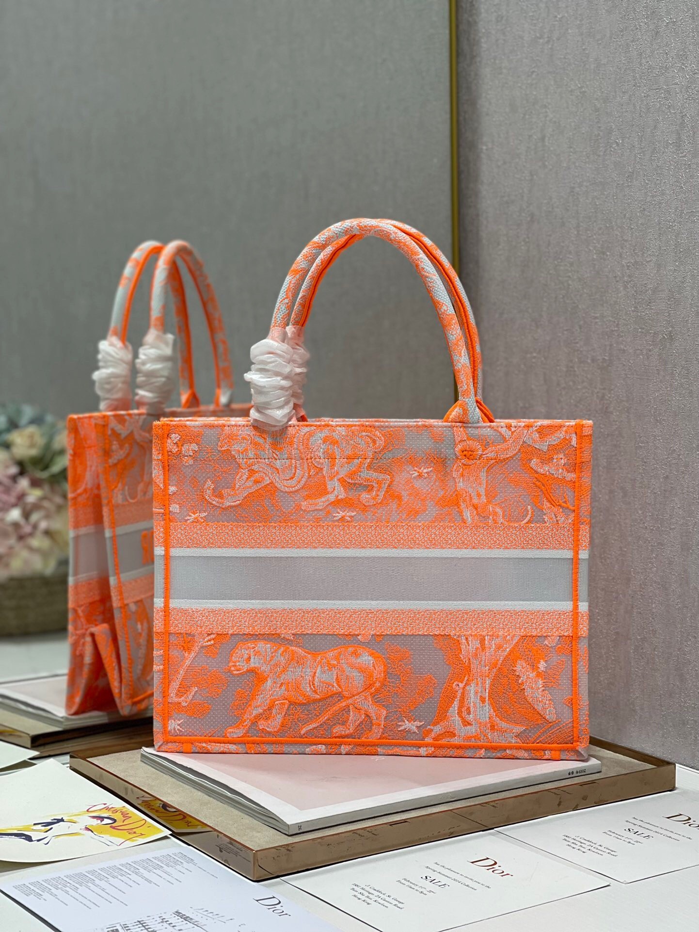 D*or medium book tote bag in orange transparent toile de jouy canvas