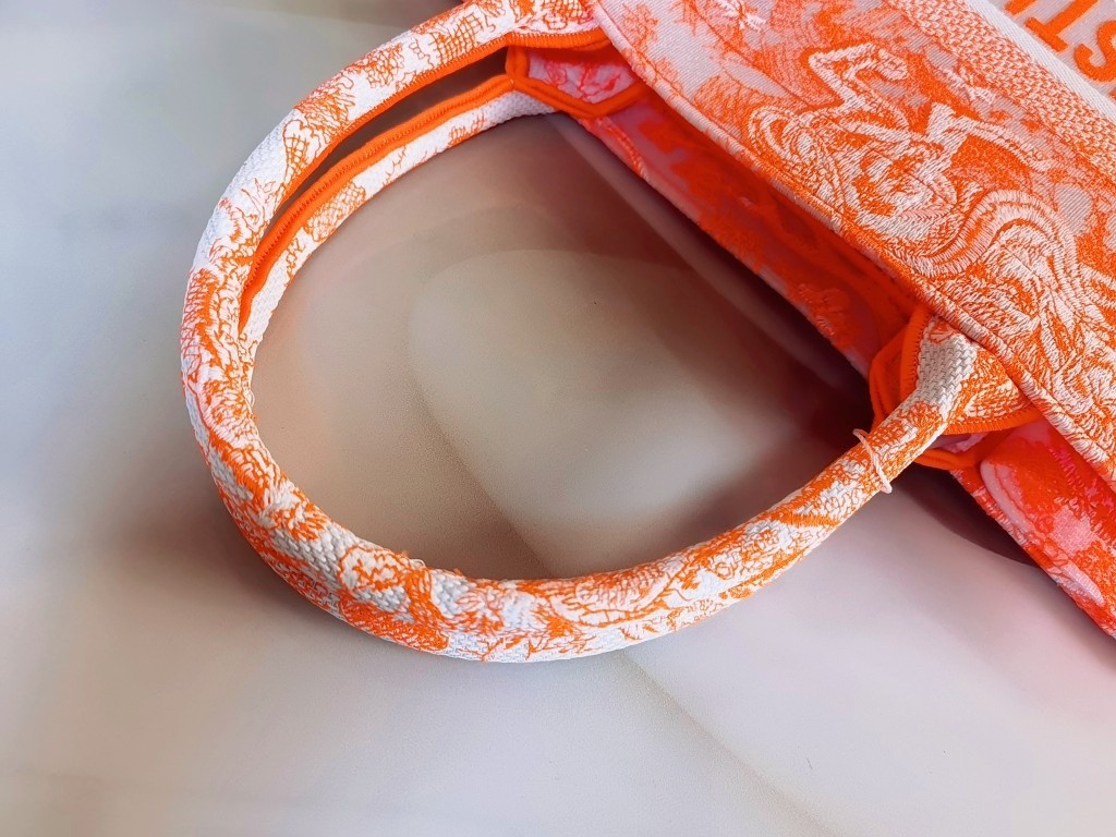 D*or medium book tote bag in orange transparent toile de jouy canvas