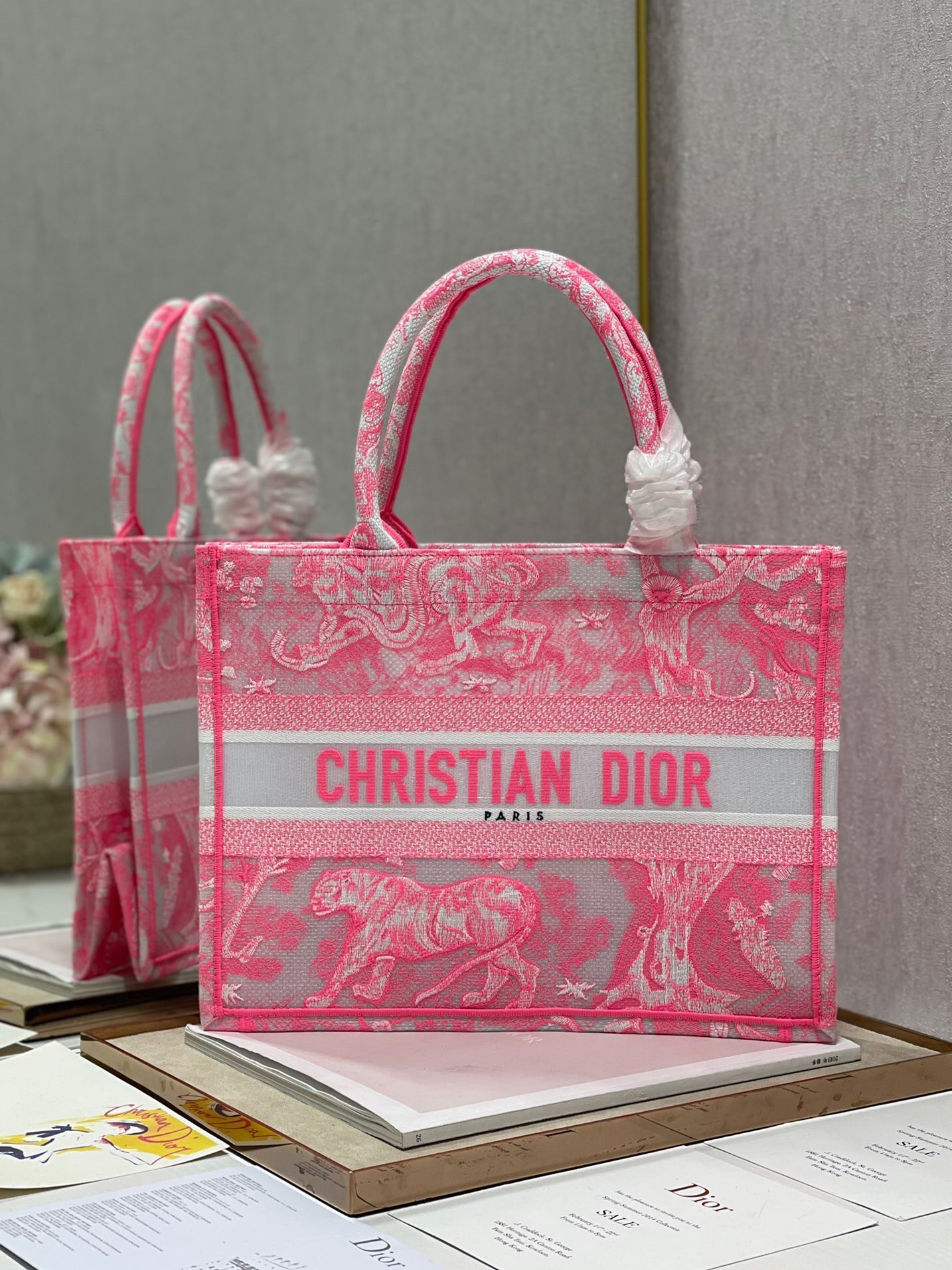 D*or medium book tote bag in pink transparent toile de jouy canvas