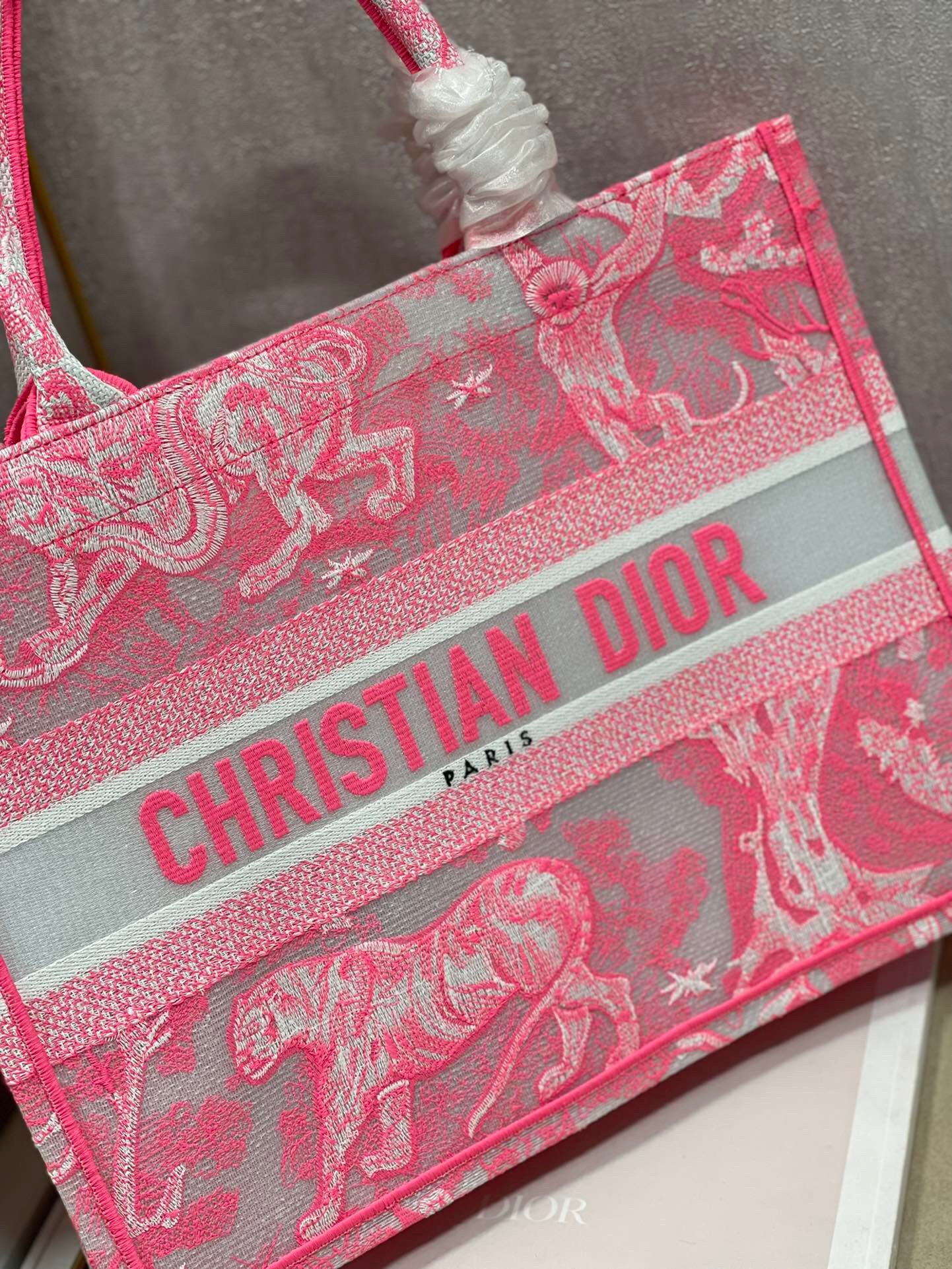 D*or medium book tote bag in pink transparent toile de jouy canvas