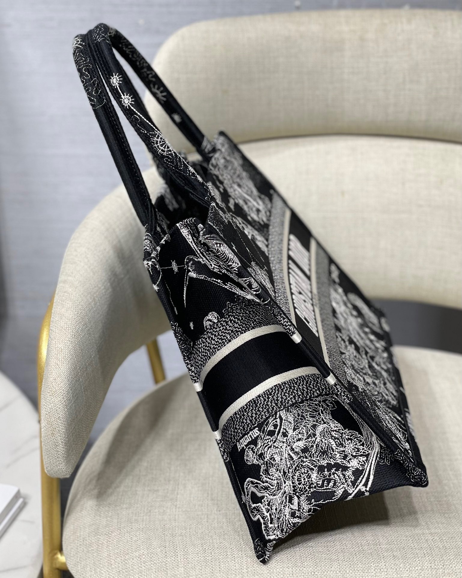 D*or medium book tote bag in black toile de jouy zodiac embroidery