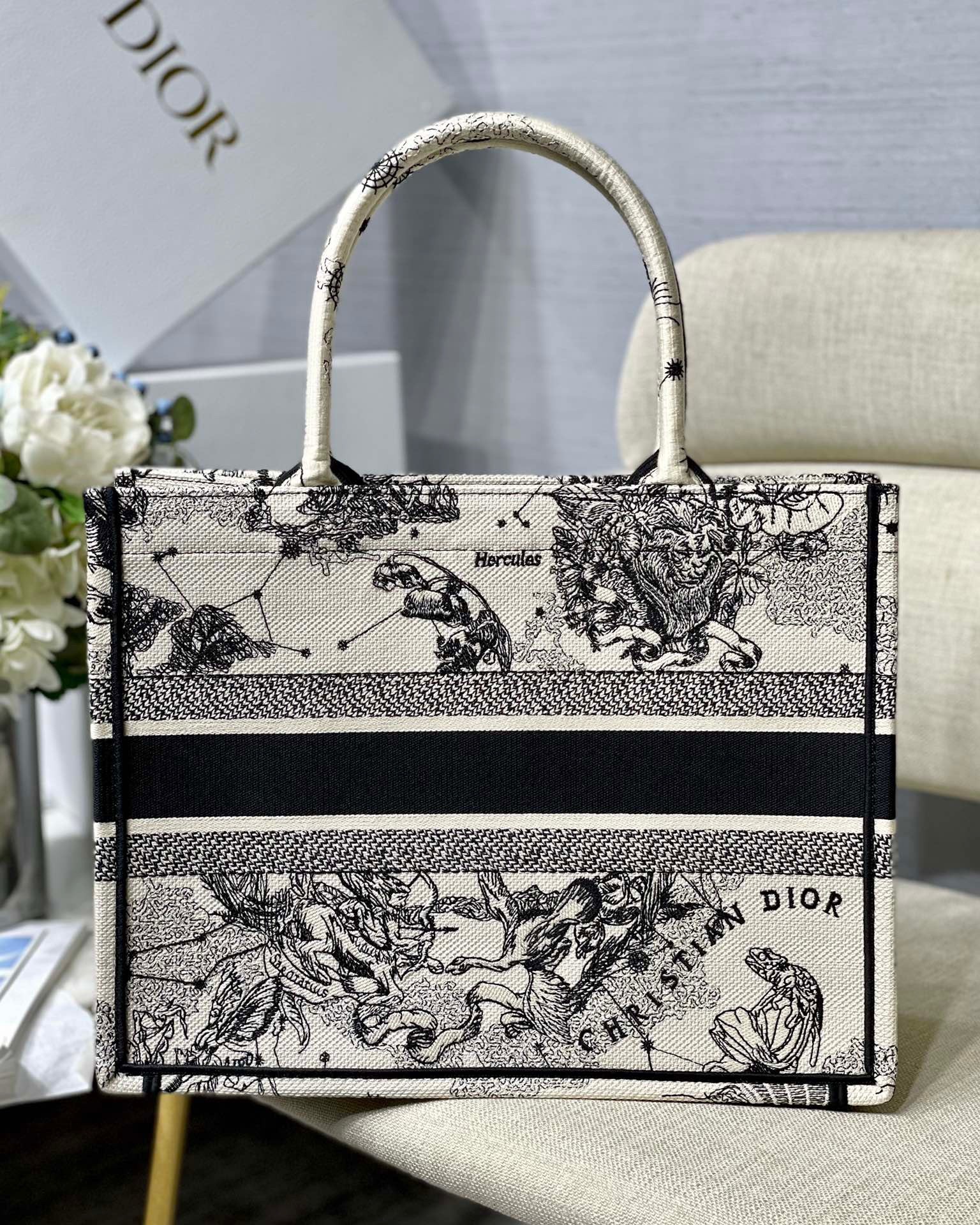 D*or medium book tote bag in white toile de jouy zodiac embroidery