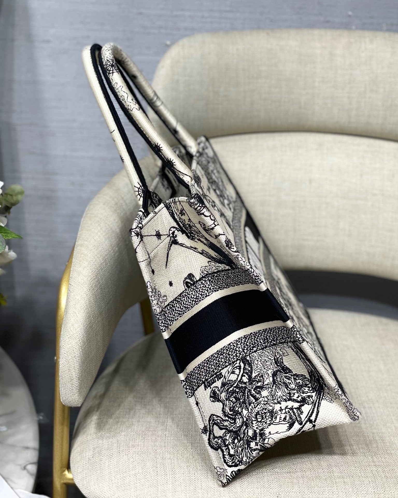D*or medium book tote bag in white toile de jouy zodiac embroidery
