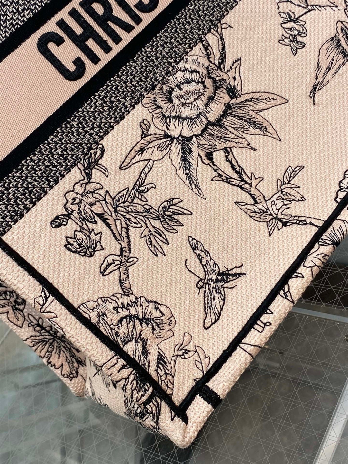 D*or large book tote bag in powder pink jardin botanique embroidery