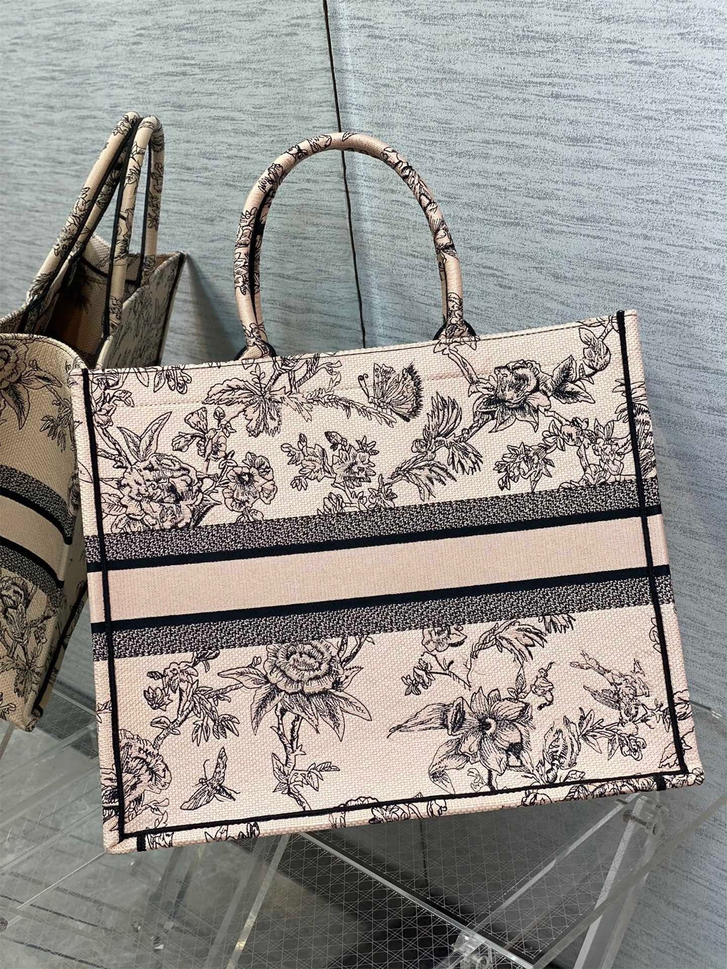 D*or large book tote bag in powder pink jardin botanique embroidery