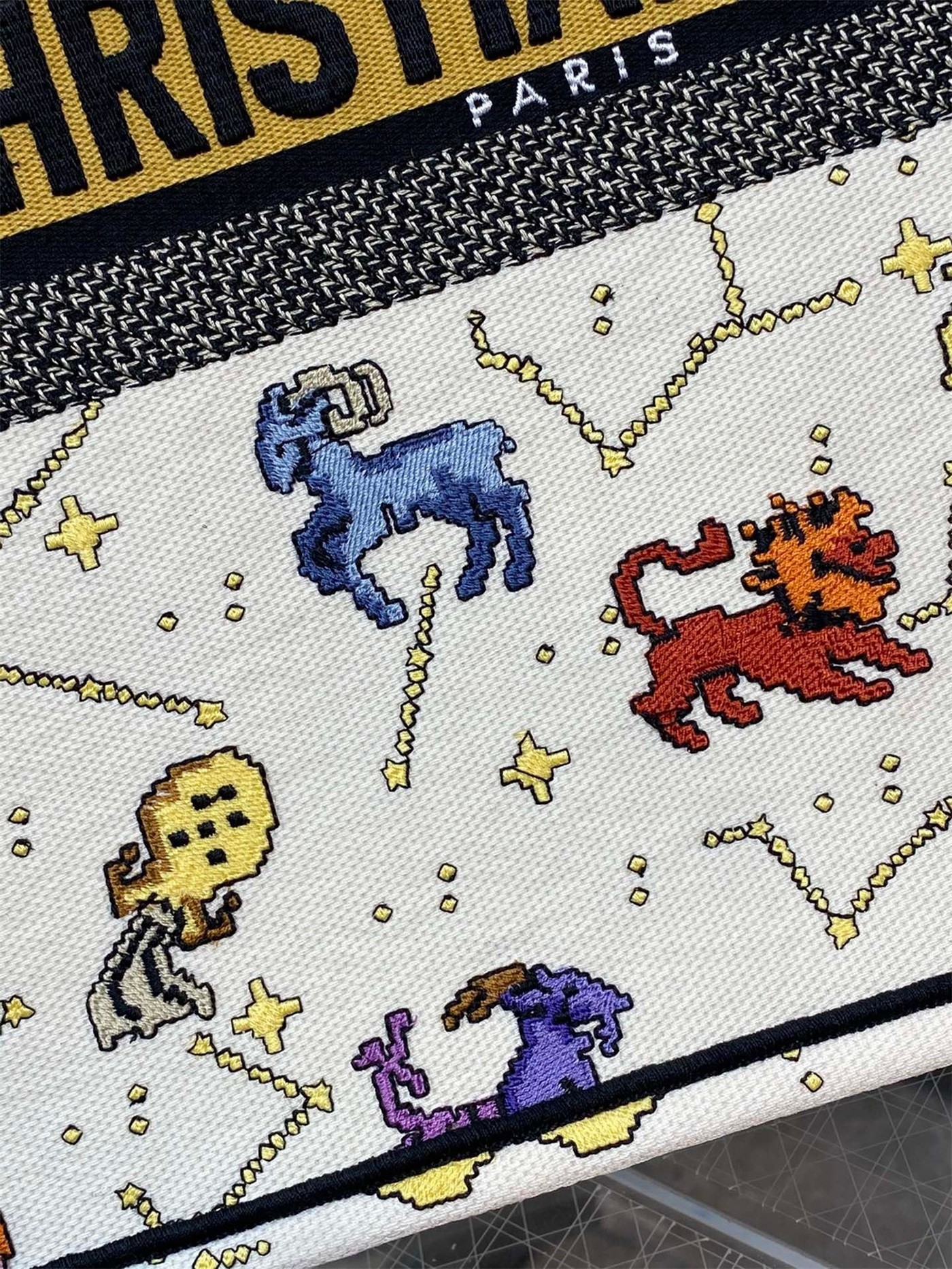 D*or large book tote bag in white pixel zodiac embroidery