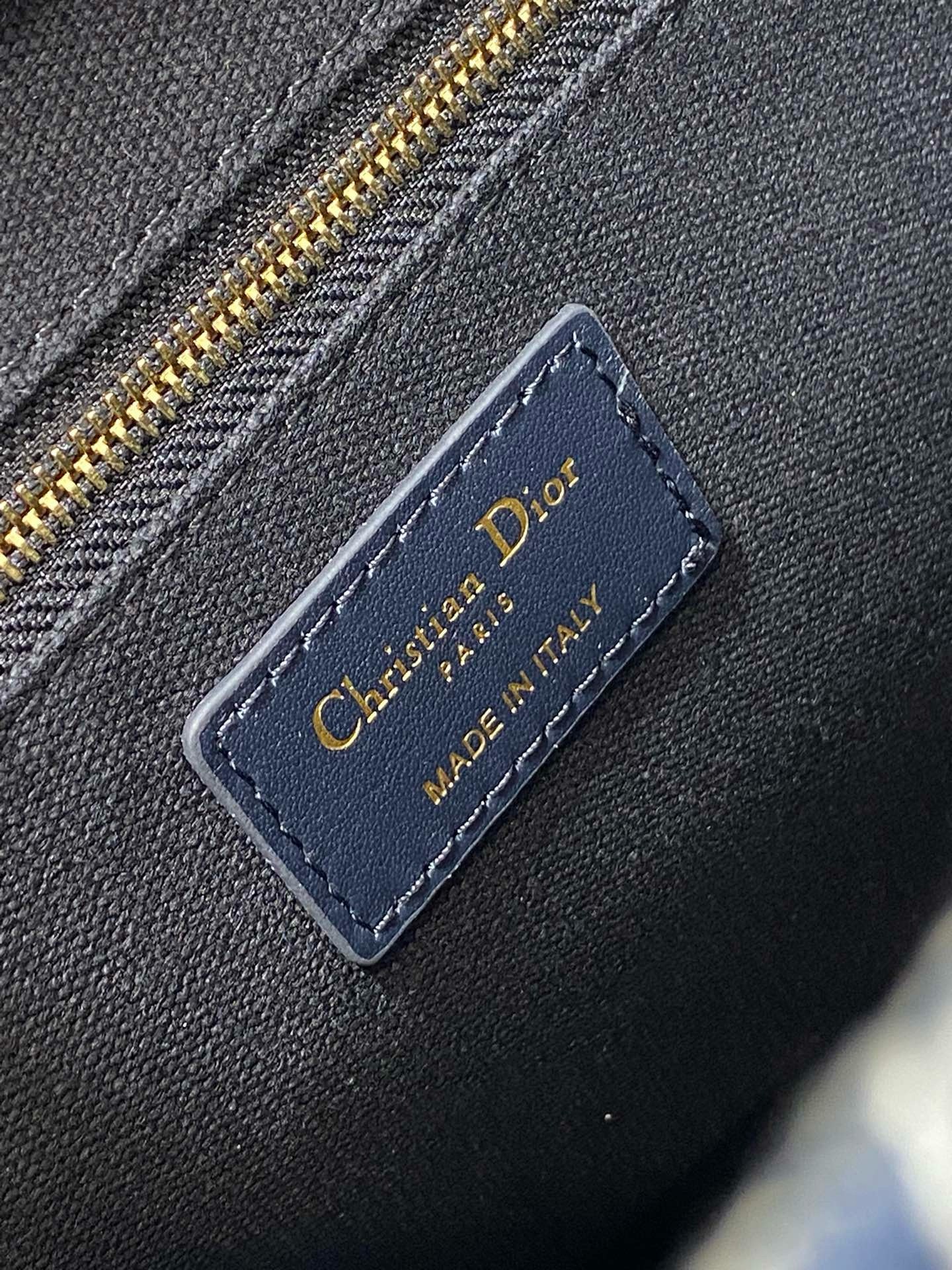 D*or small book tote bag with strap in toile de jouy reverse embroidery and blue calfskin