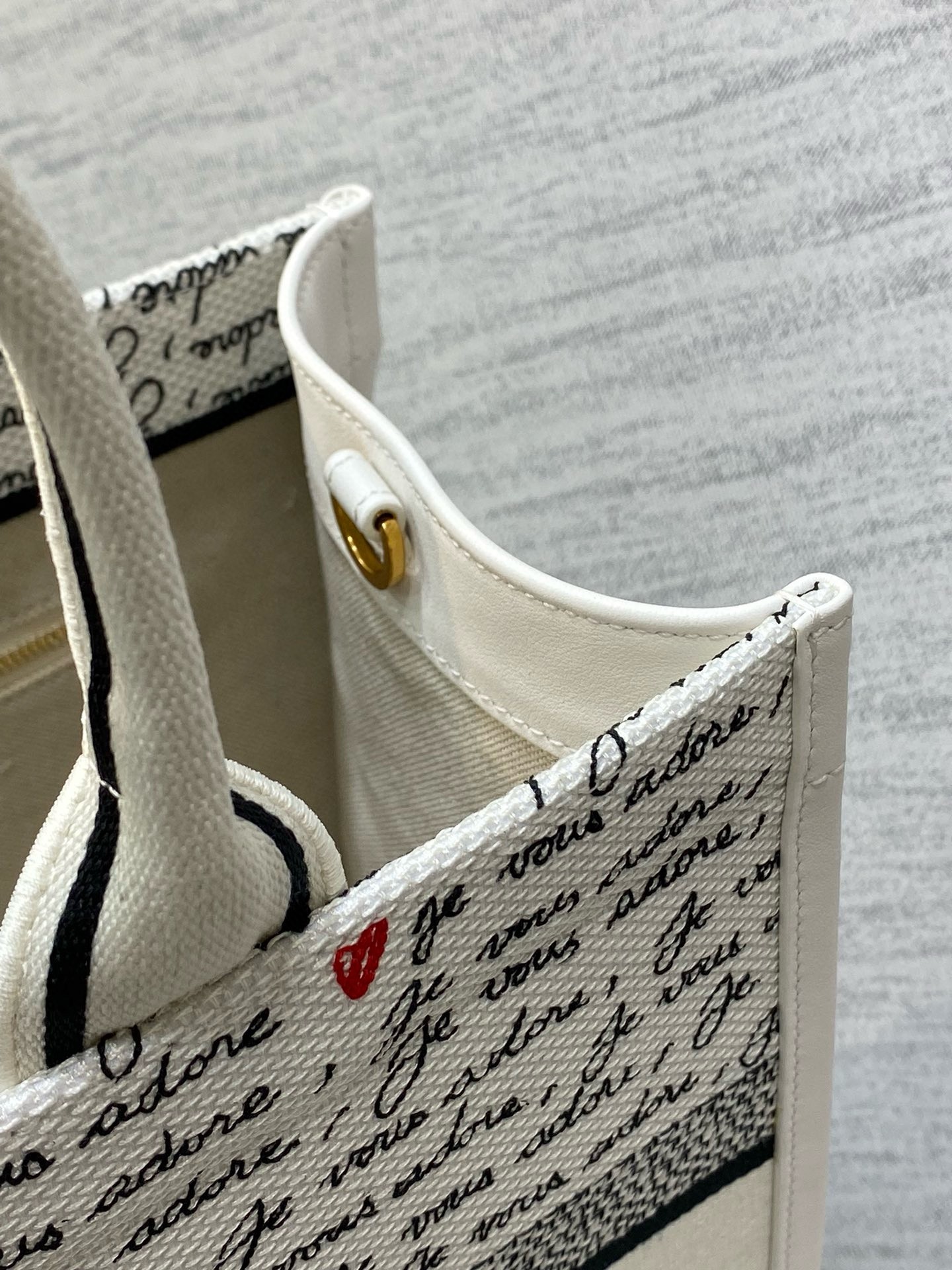 D*or D*oramour medium book tote bag with strap in je vous adore embroidery and white calfskin