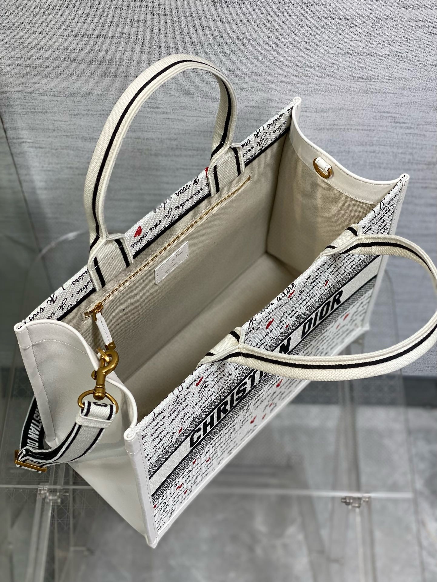 D*or D*oramour medium book tote bag with strap in je vous adore embroidery and white calfskin