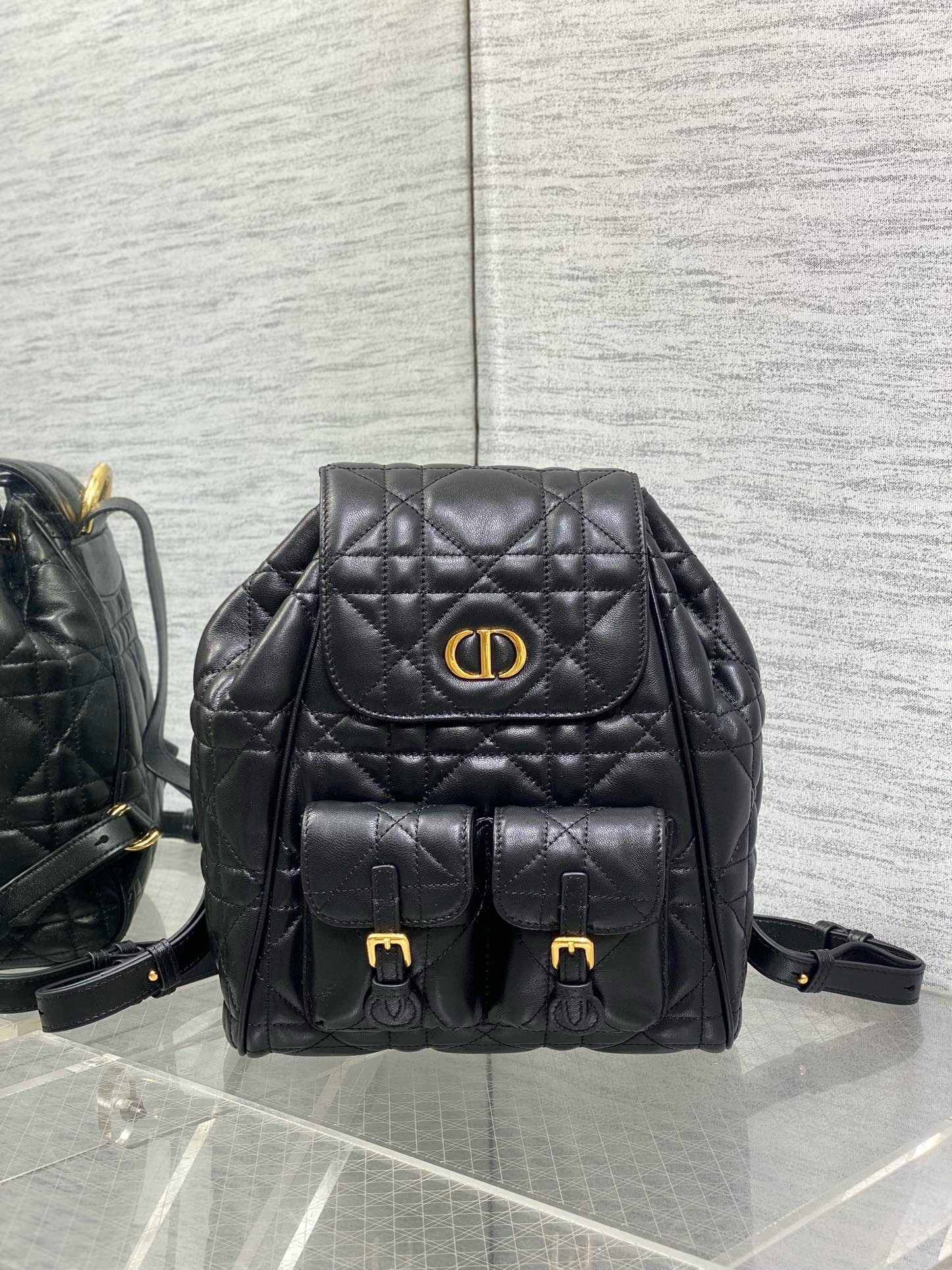 D*or caro medium backpack in black macrocannage lambskin