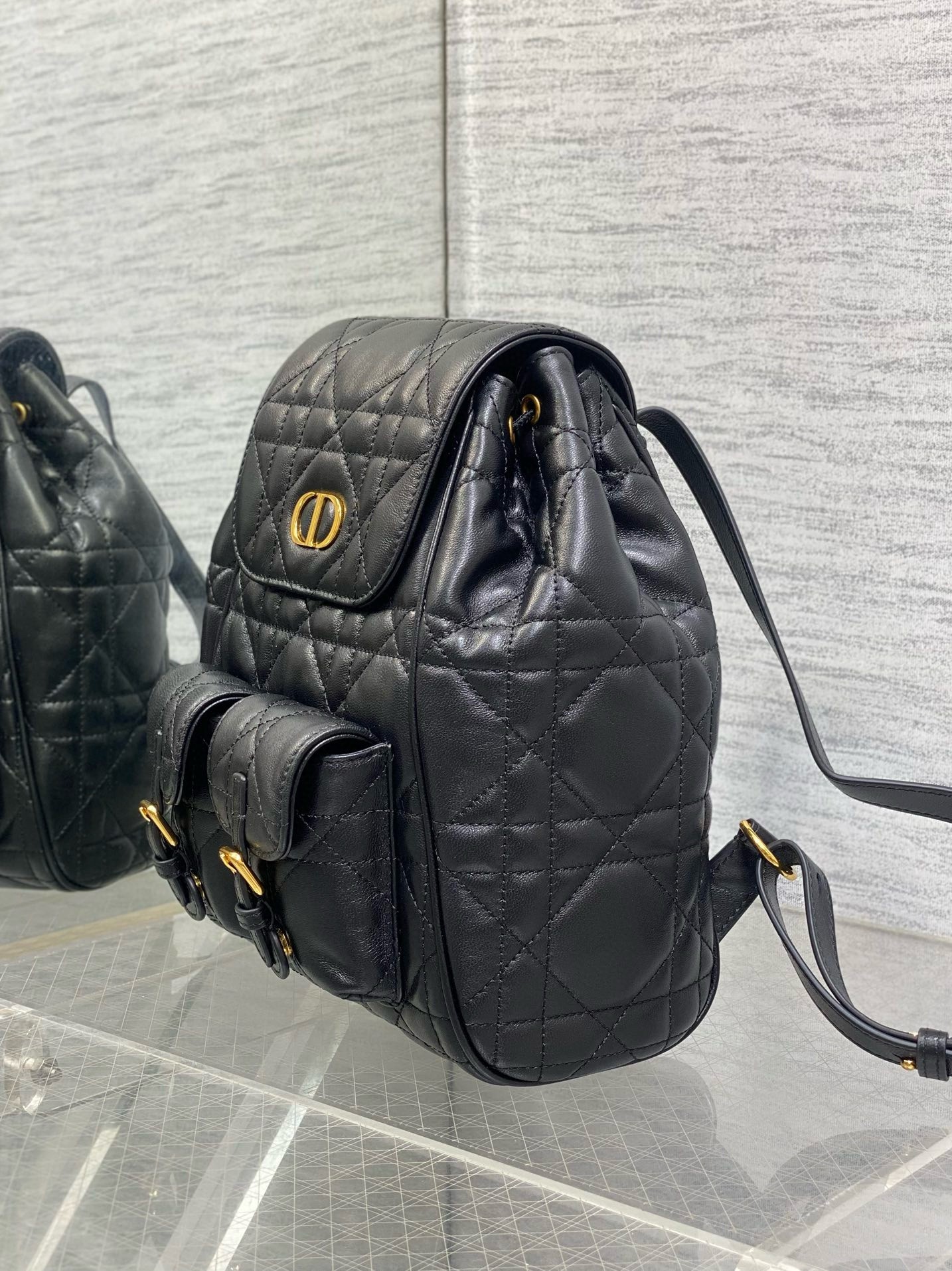 D*or caro medium backpack in black macrocannage lambskin