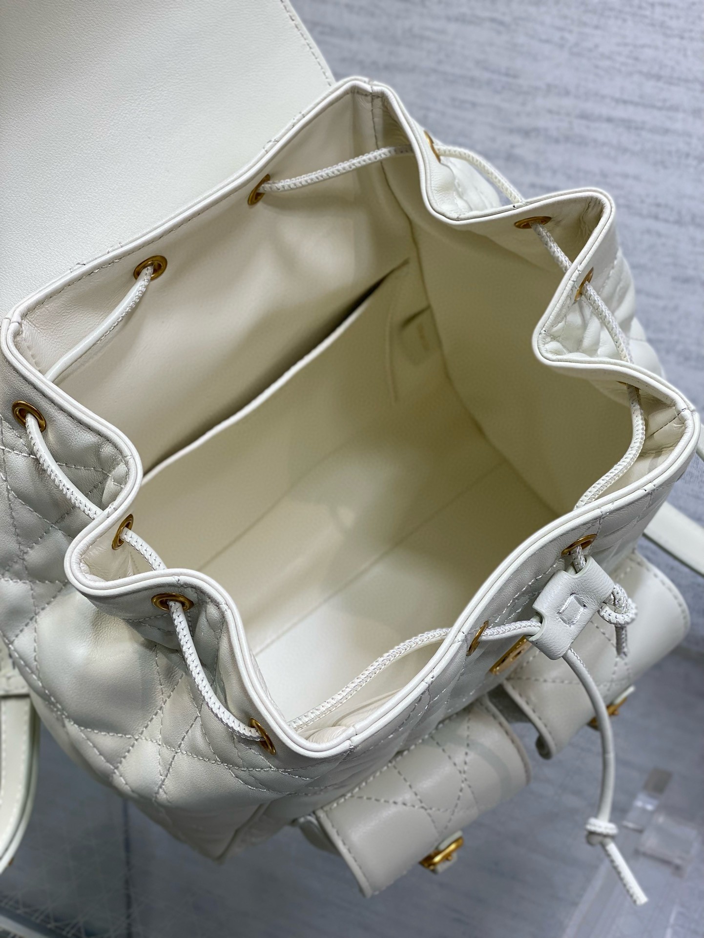 D*or caro medium backpack in white macrocannage lambskin