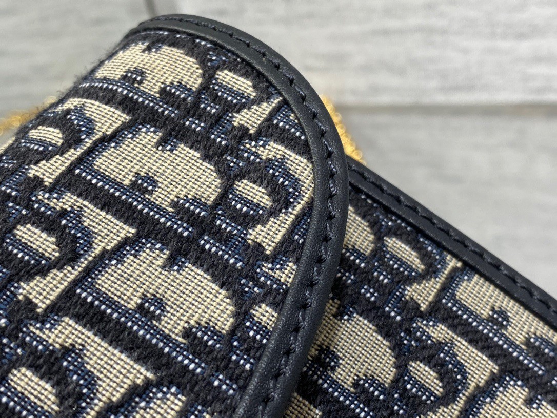 D*or bobby east-west chain pouch in blue oblique jacquard