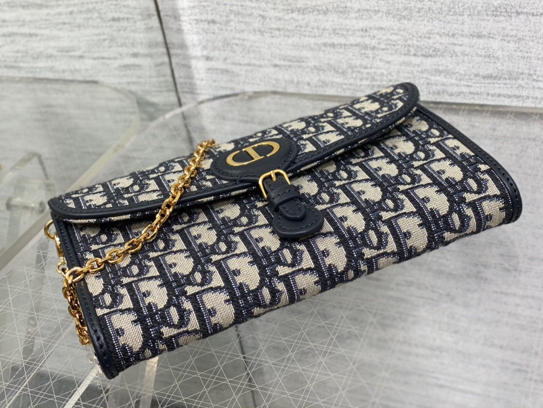 D*or bobby east-west chain pouch in blue oblique jacquard