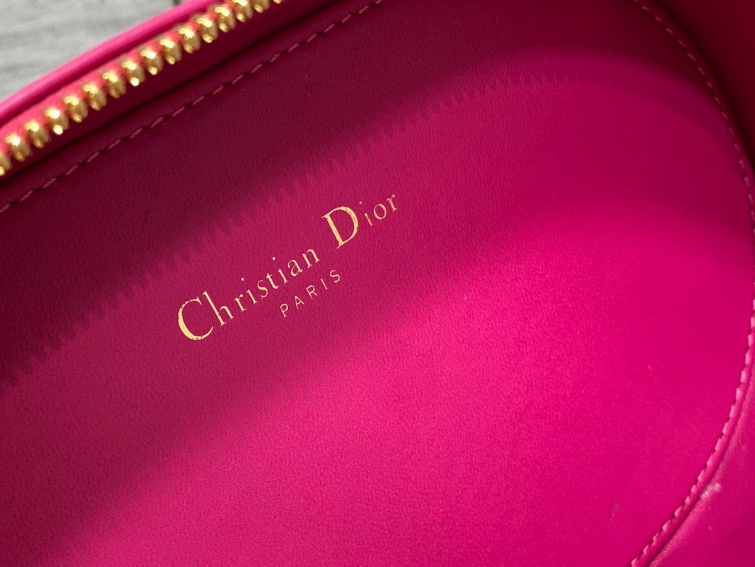 D*or cd signature oval camera bag in rani pink calfskin
