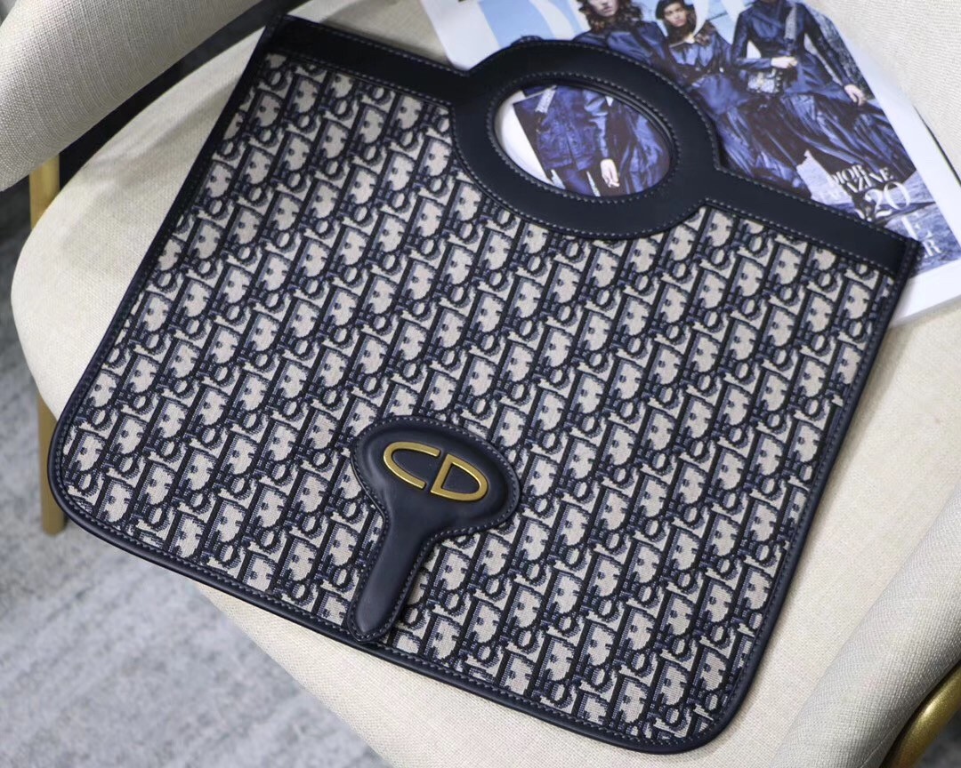 D*or fold over clutch in blue oblique canvas