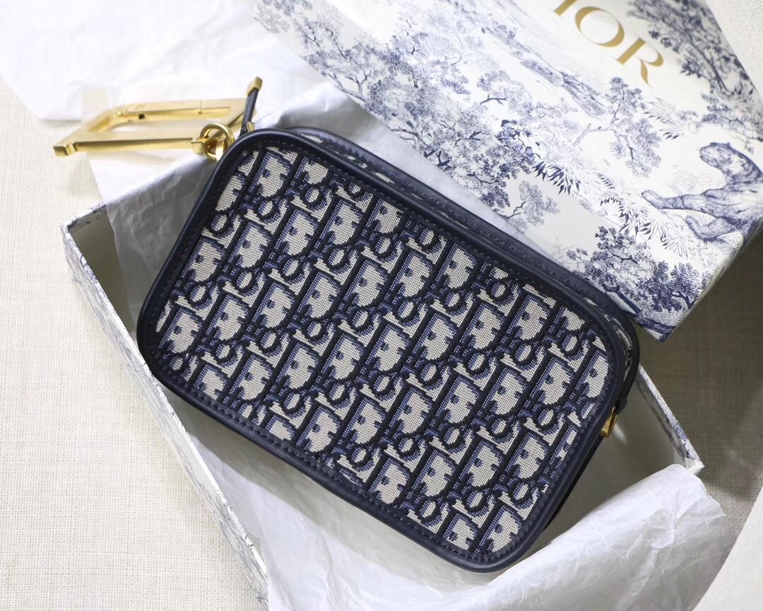 D*or D*orquake clutch in blue D*or oblique canvas