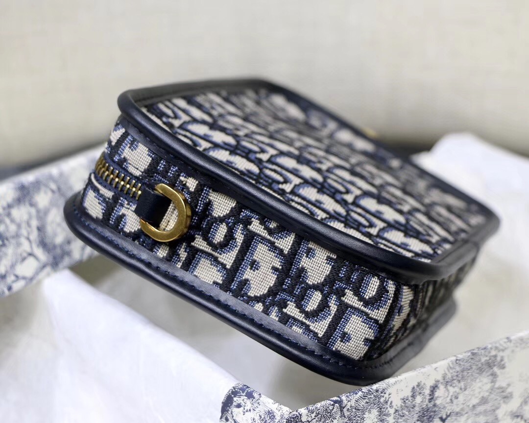 D*or D*orquake clutch in blue D*or oblique canvas