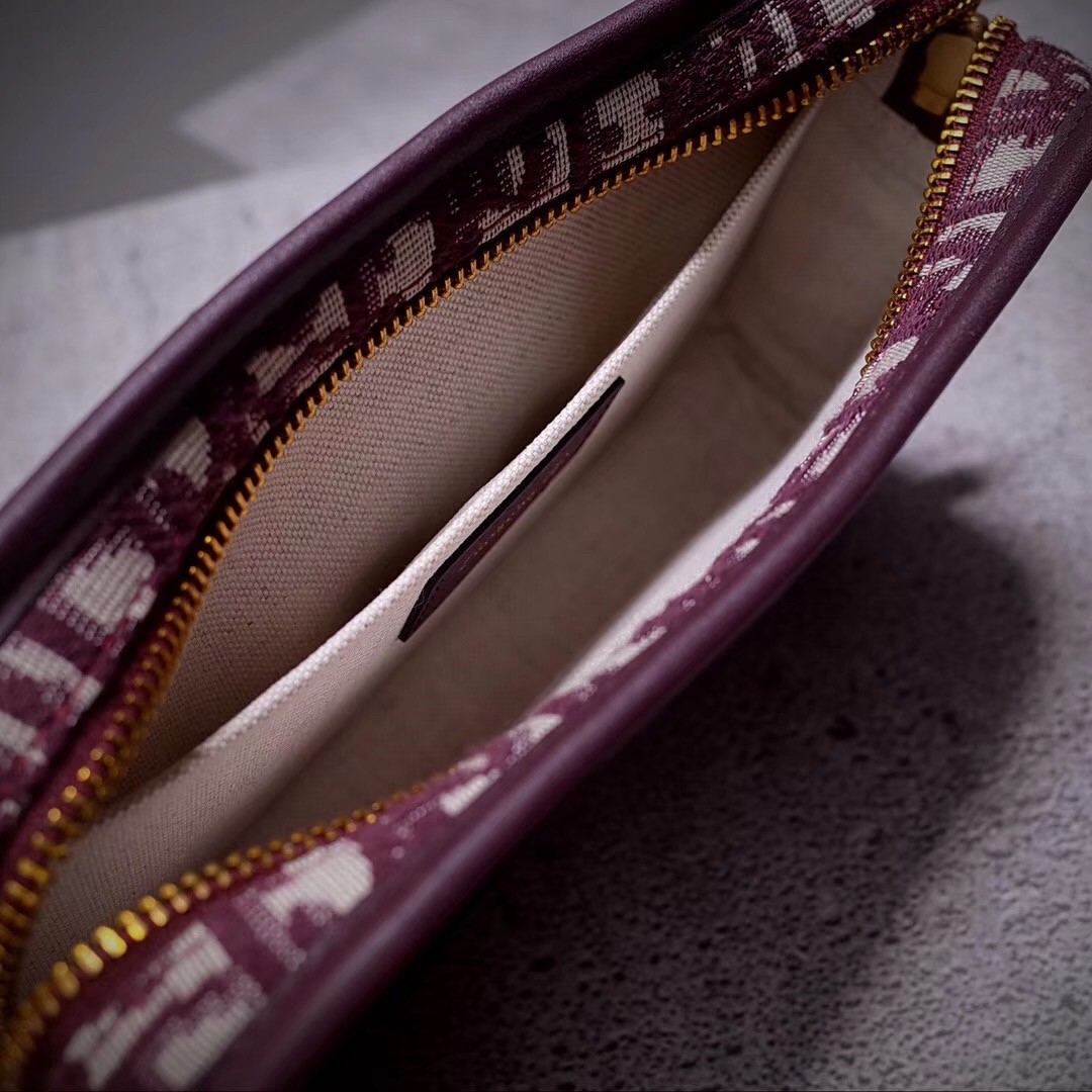 D*or D*orquake clutch in bordeaux D*or oblique canvas