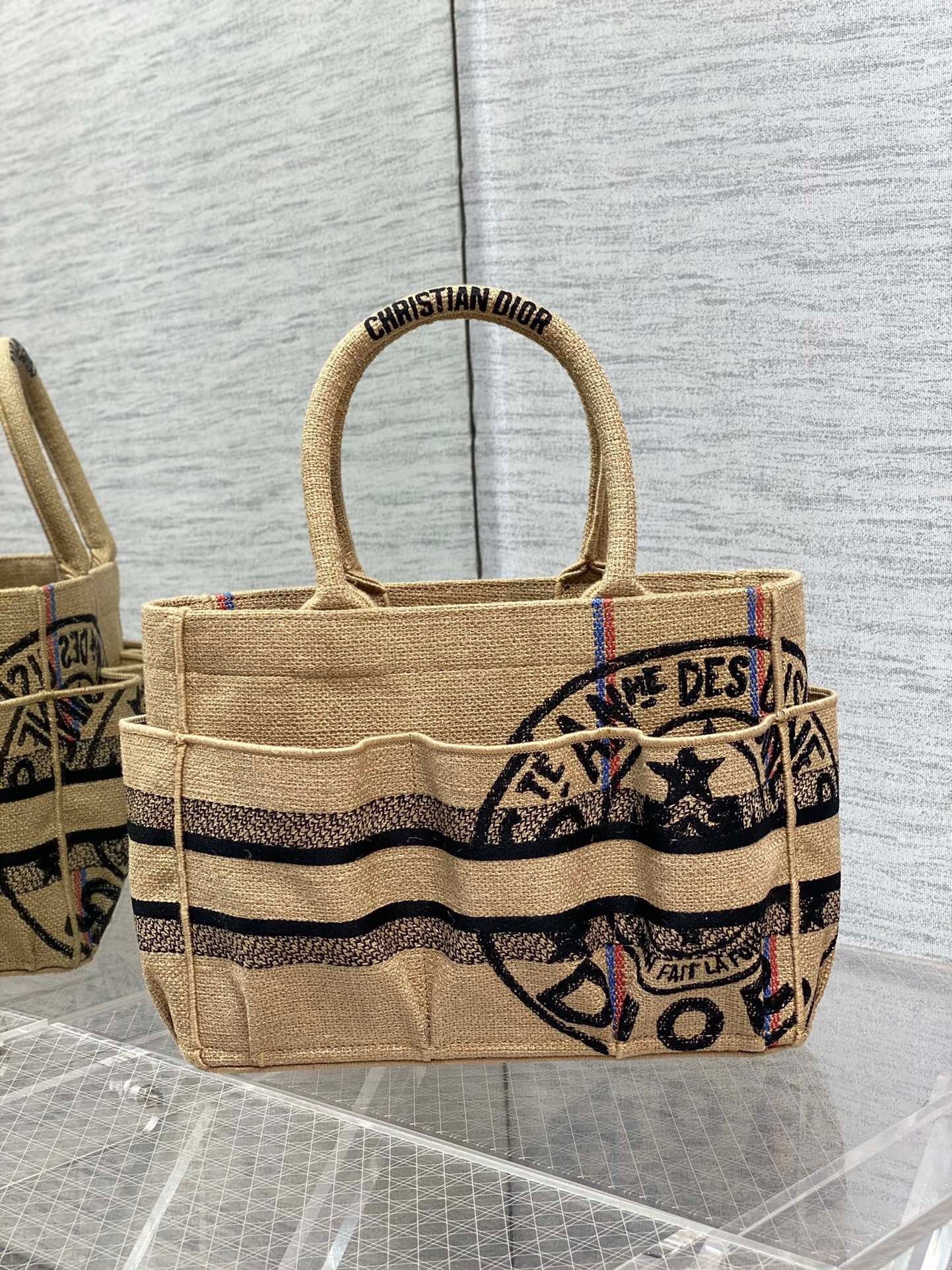 D*or small catherine tote bag in beige jute canvas with union motif
