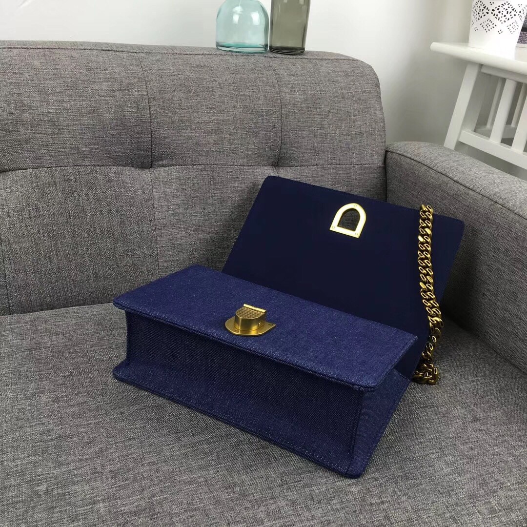 D*or D*orama flap bag in denim and studded