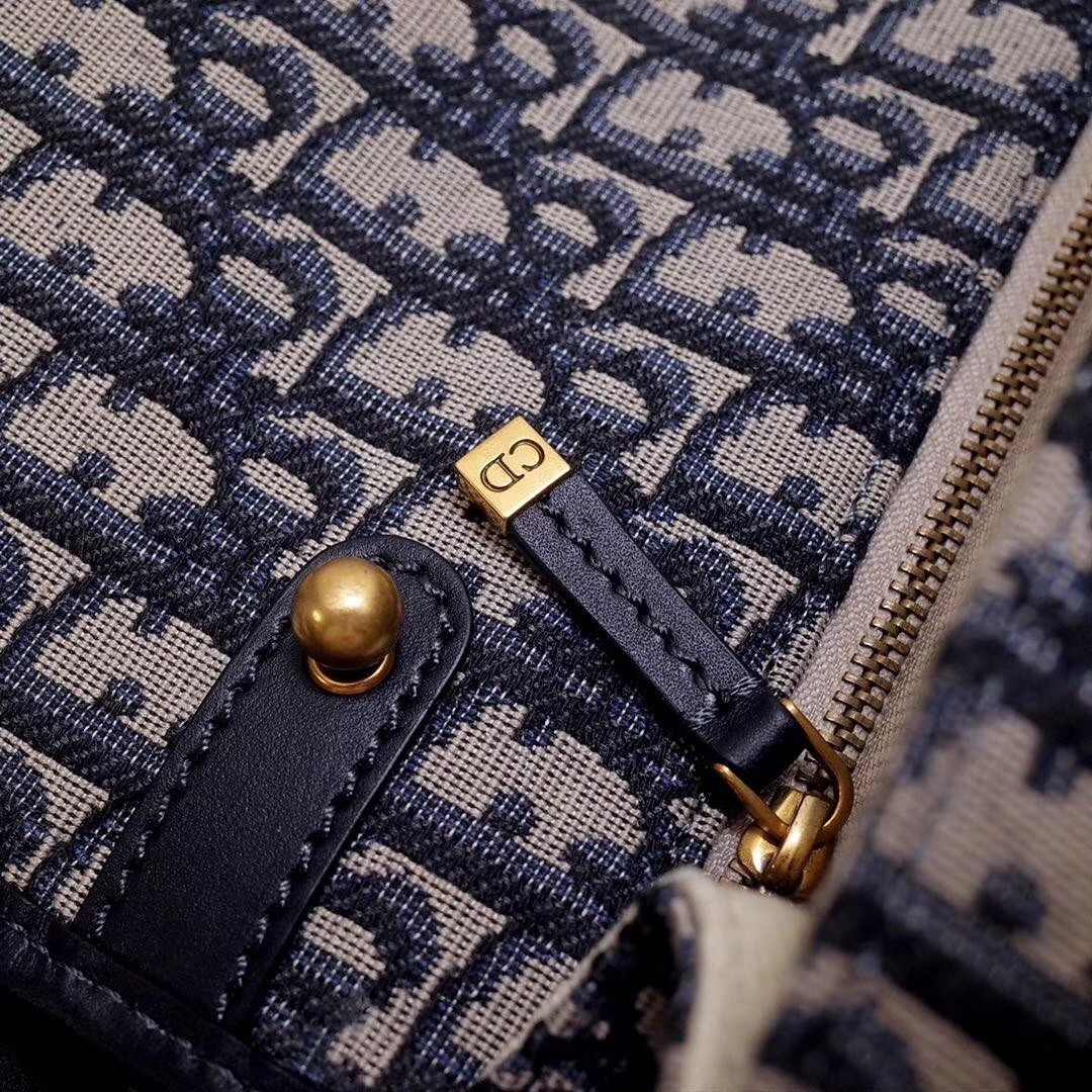 D*or D*oraddict flap bag in blue oblique canvas