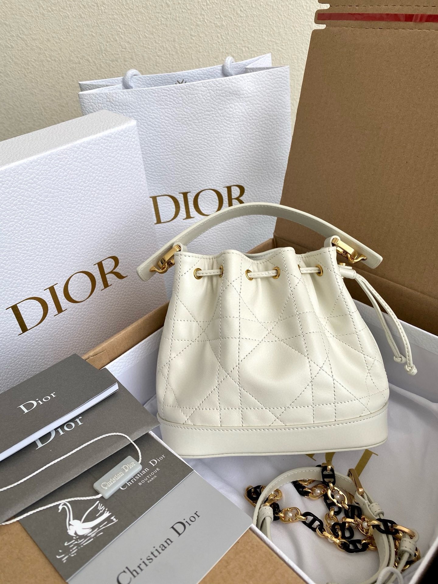 D*or small jolie bucket bag in white macrocannage lambskin