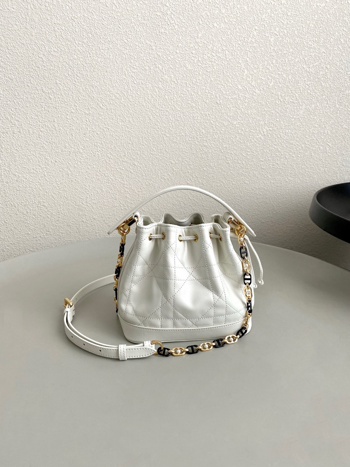 D*or small jolie bucket bag in white macrocannage lambskin