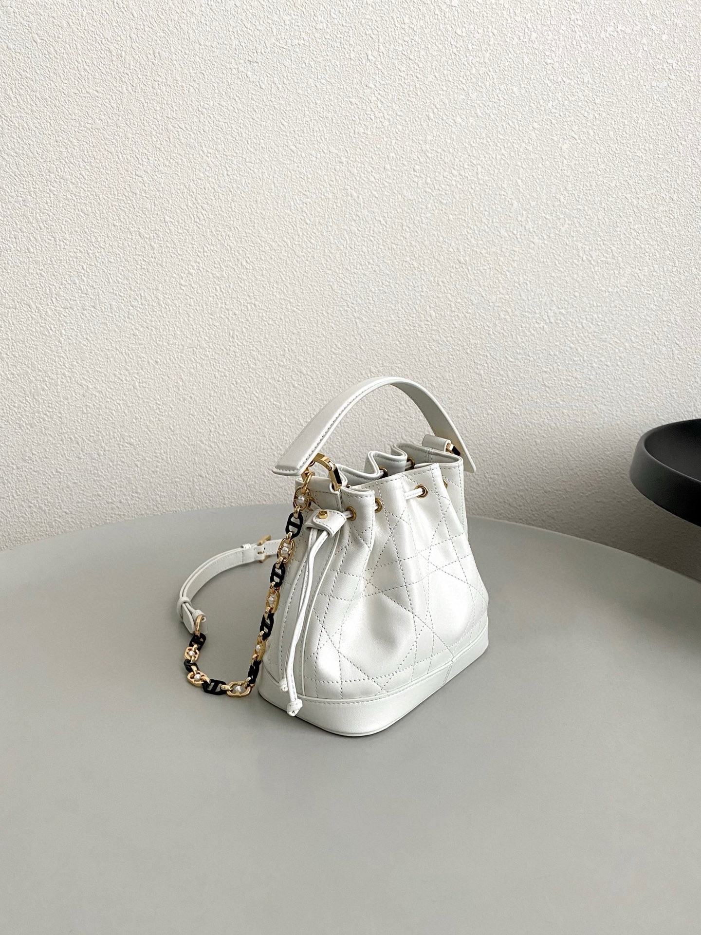 D*or small jolie bucket bag in white macrocannage lambskin