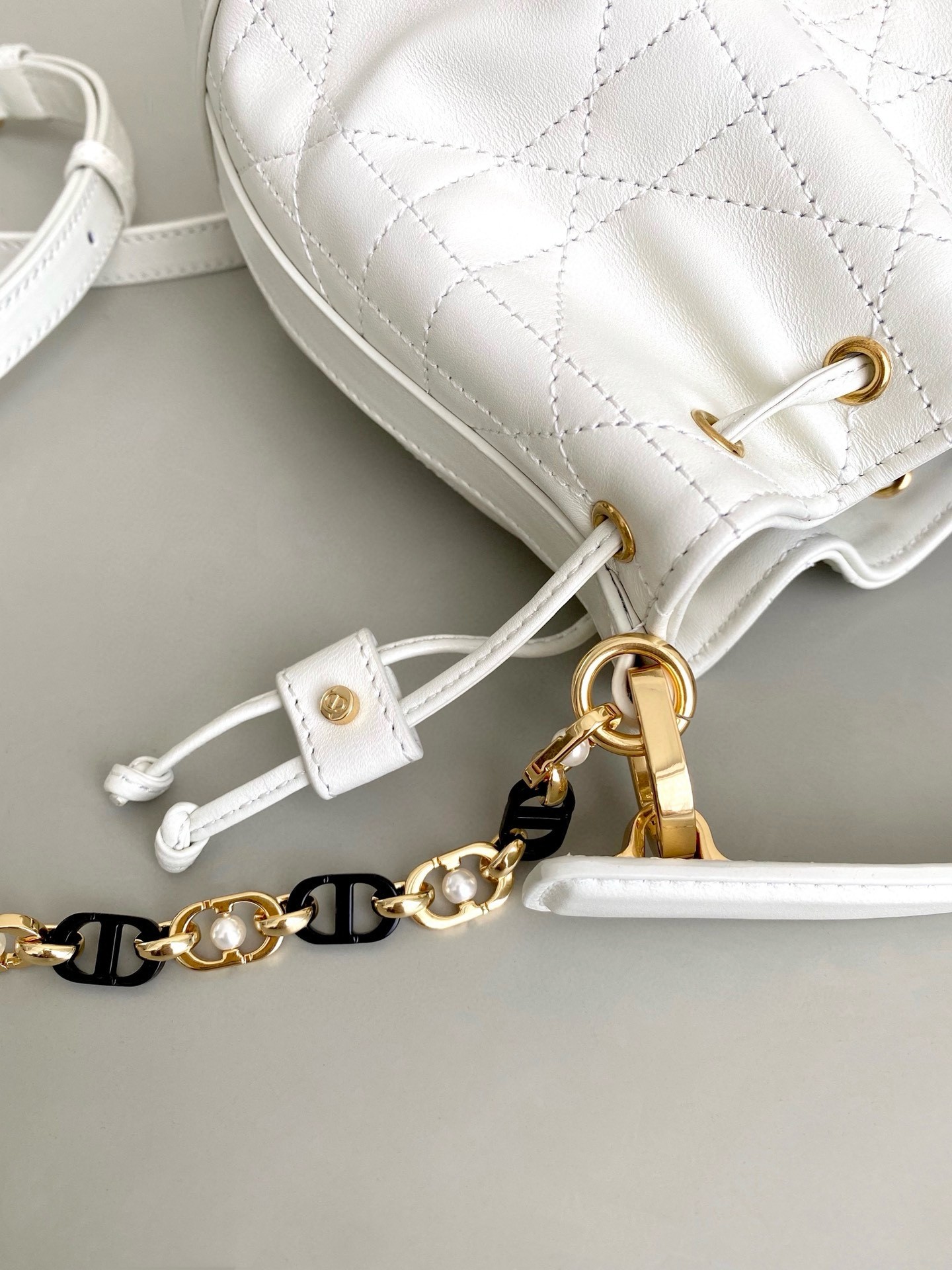 D*or small jolie bucket bag in white macrocannage lambskin