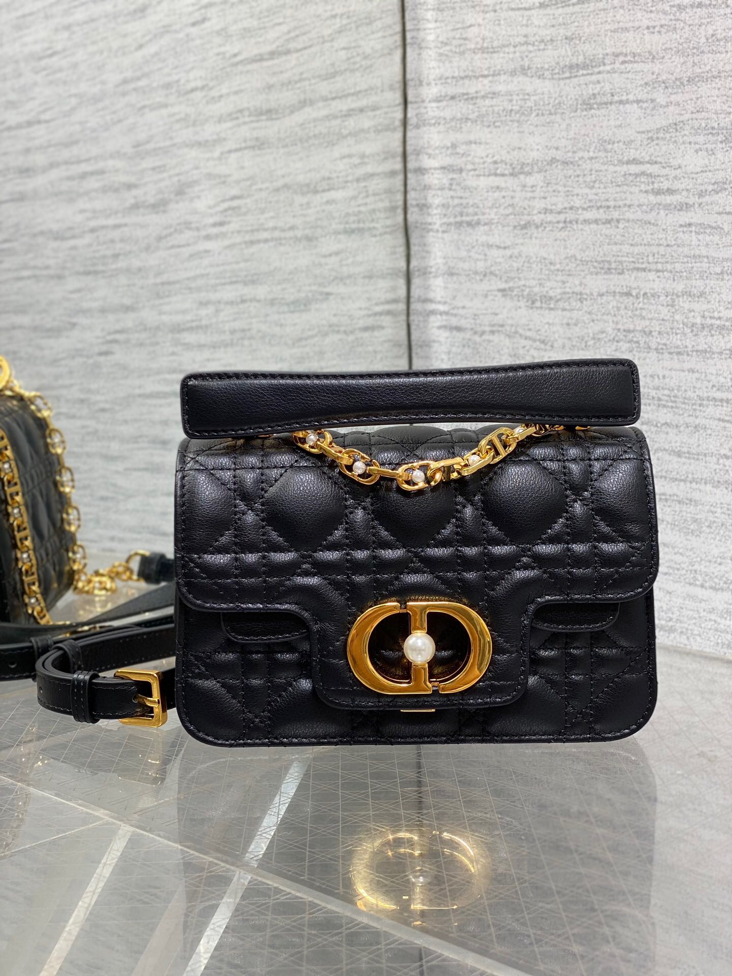 D*or mini jolie top handle bag in black cannage calfskin