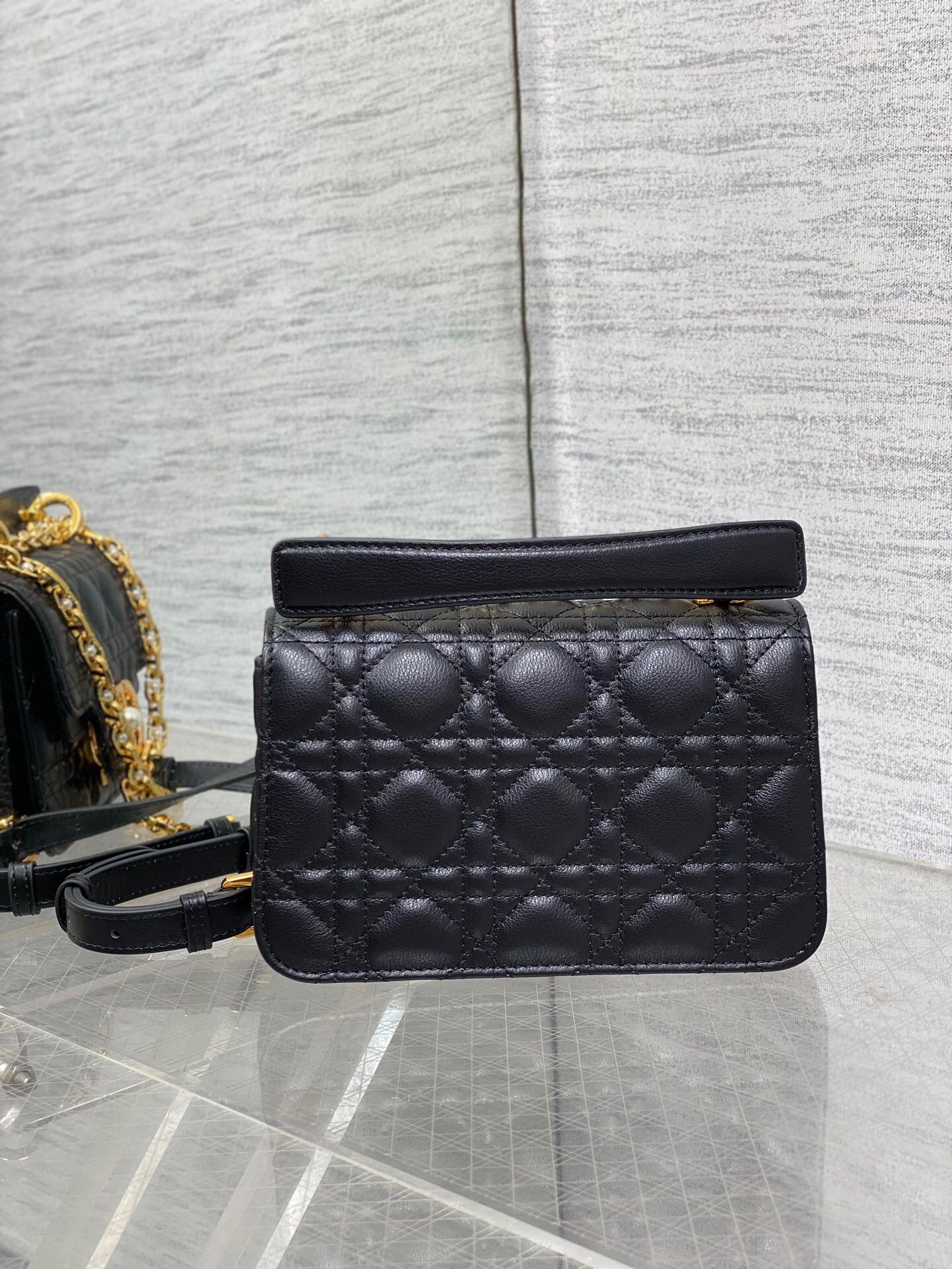 D*or mini jolie top handle bag in black cannage calfskin