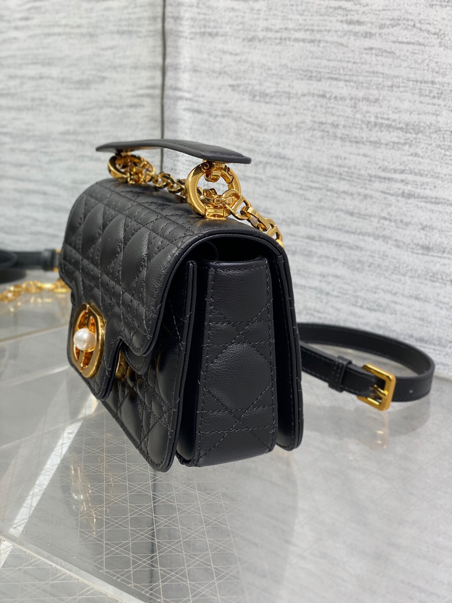 D*or mini jolie top handle bag in black cannage calfskin