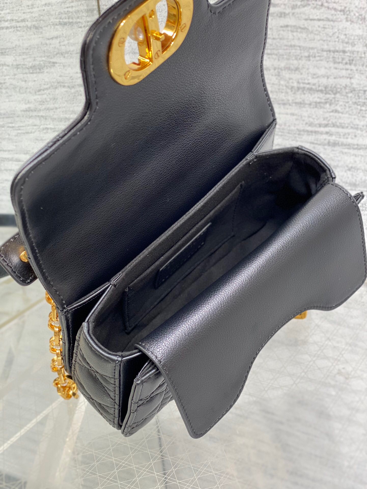 D*or mini jolie top handle bag in black cannage calfskin