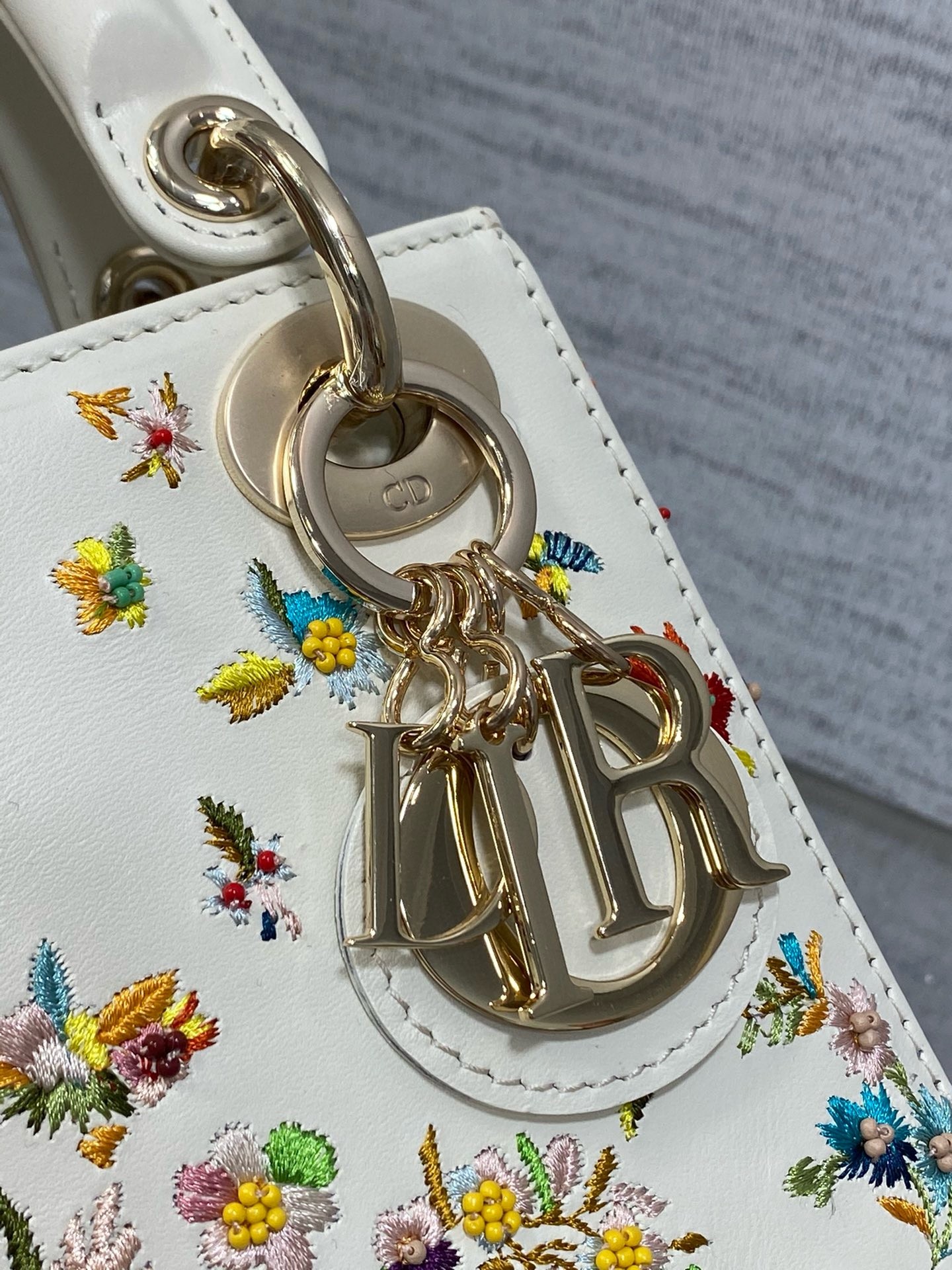 D*or lady D*or mini bag in white calfskin with multicolor small flowers