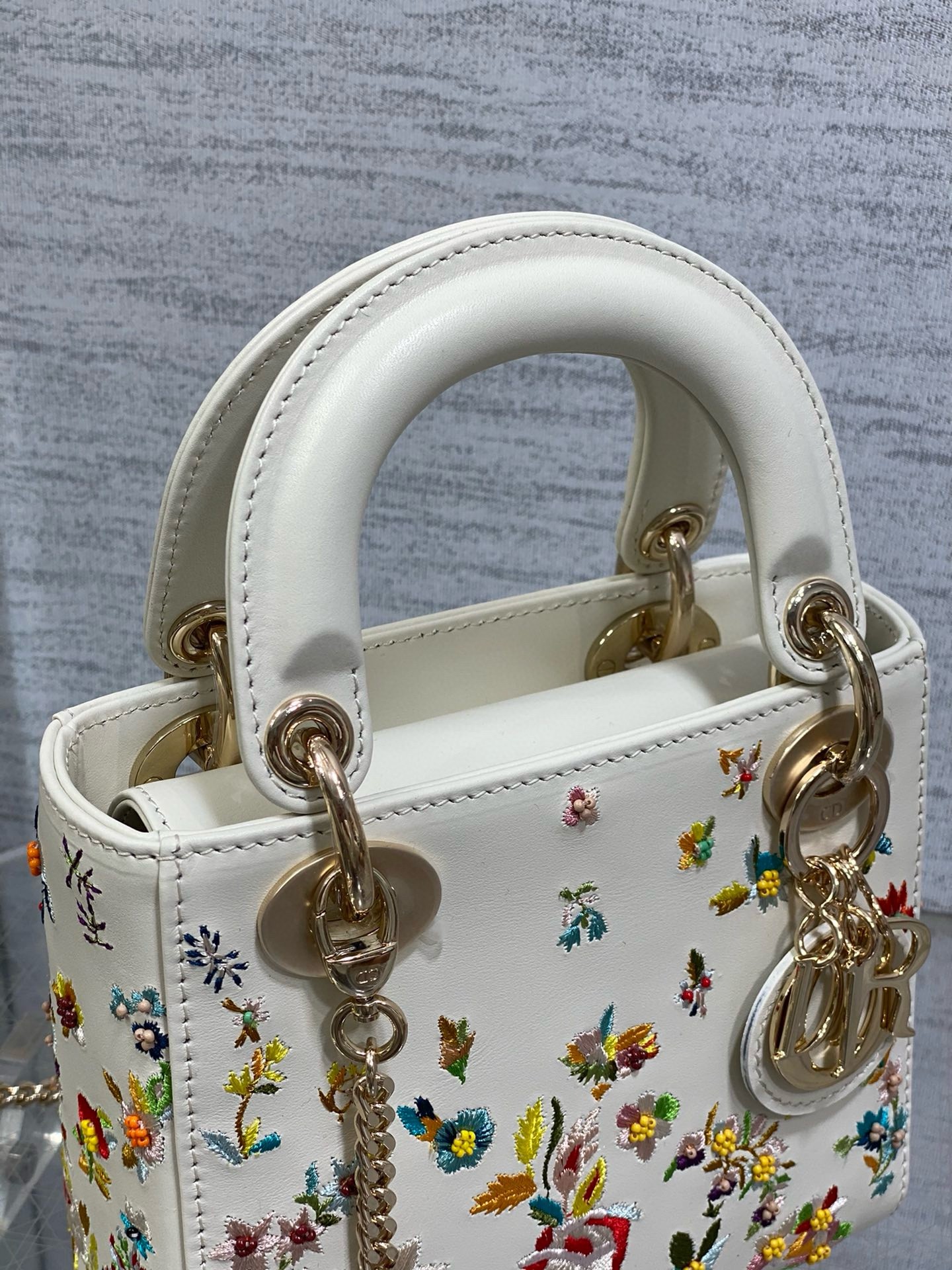 D*or lady D*or mini bag in white calfskin with multicolor small flowers