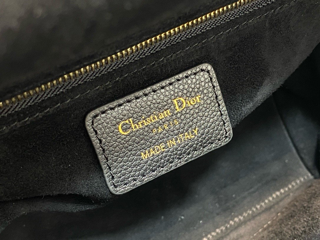 D*or small lady D*or bag in black grained cannage calfskin